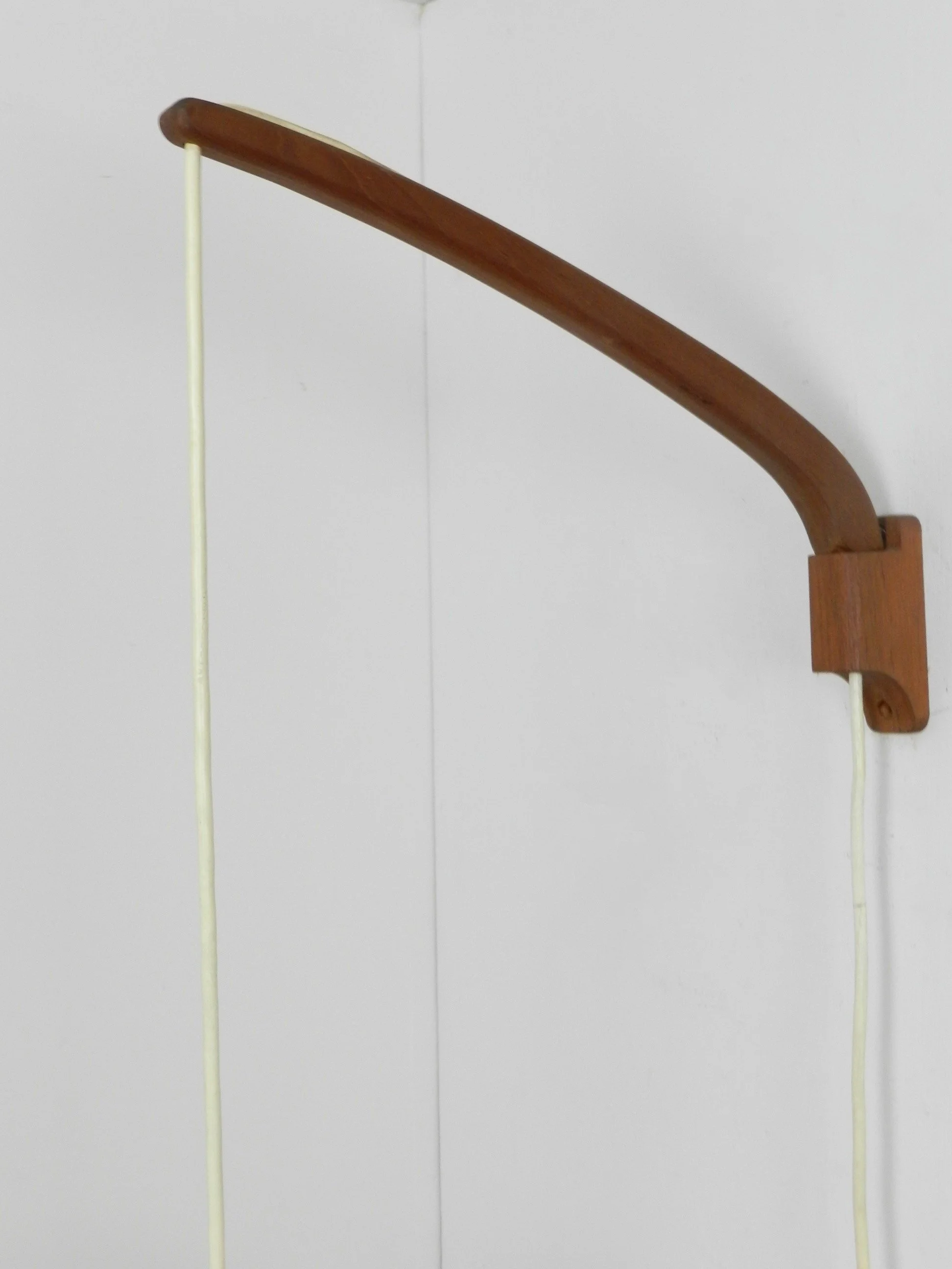 Scandinavian mid century wall lamp in teak with glass and string shade.  Finland, 1960s.