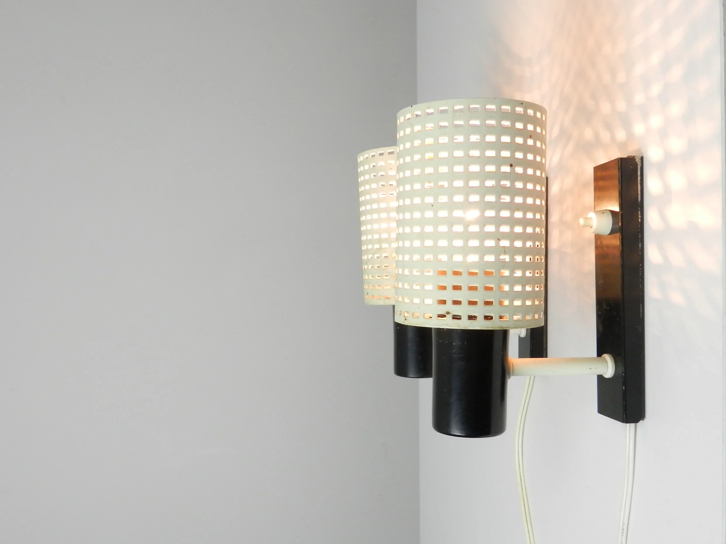 Pair of mid century modern wall lamps by Hala Zeist.  Netherlands, 1960s.