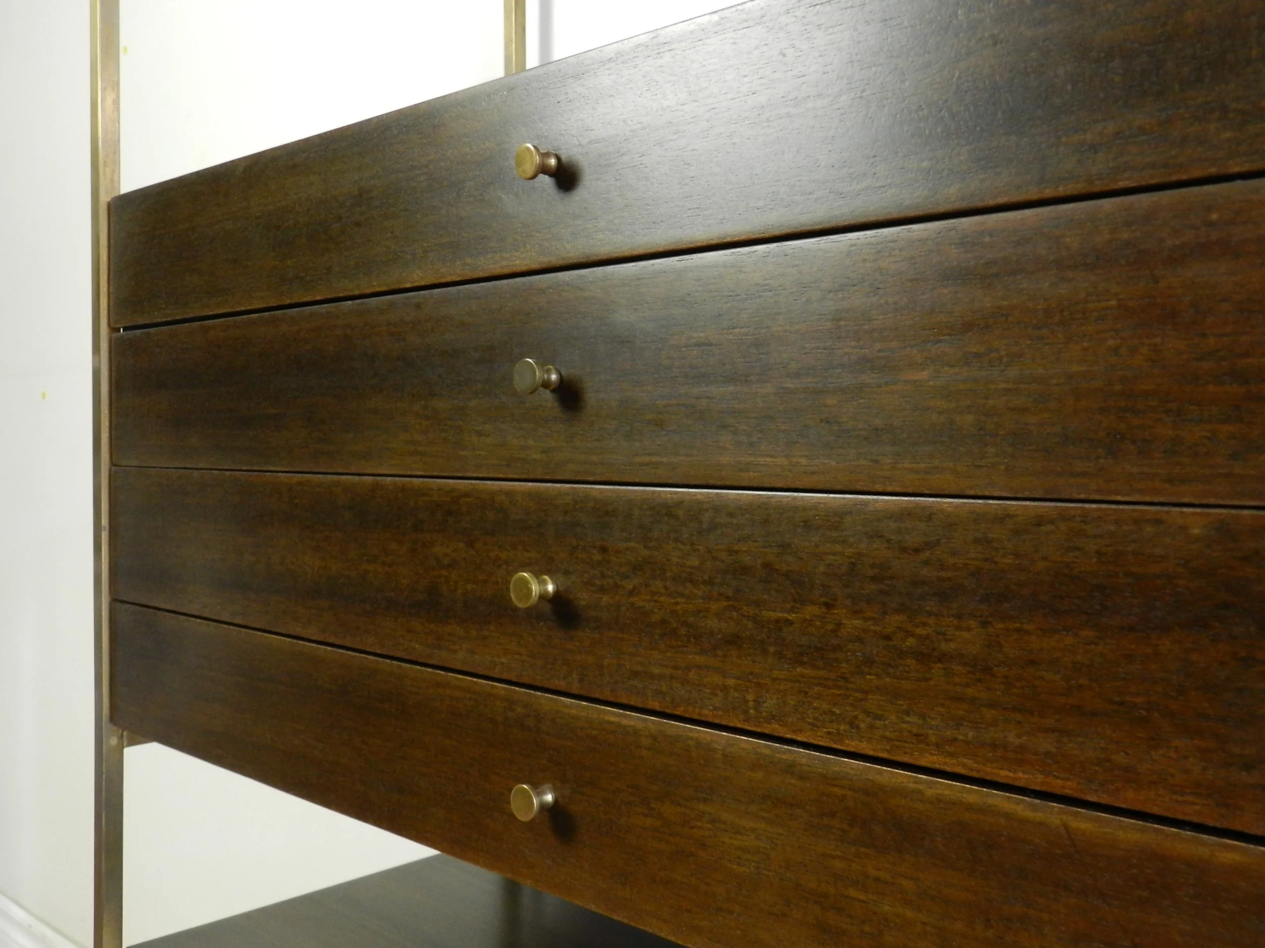 Mid century modern “The Irwin Collection” wall unit in mahogany and brass designed by Paul McCobb for Calvin.  USA, 1950s.