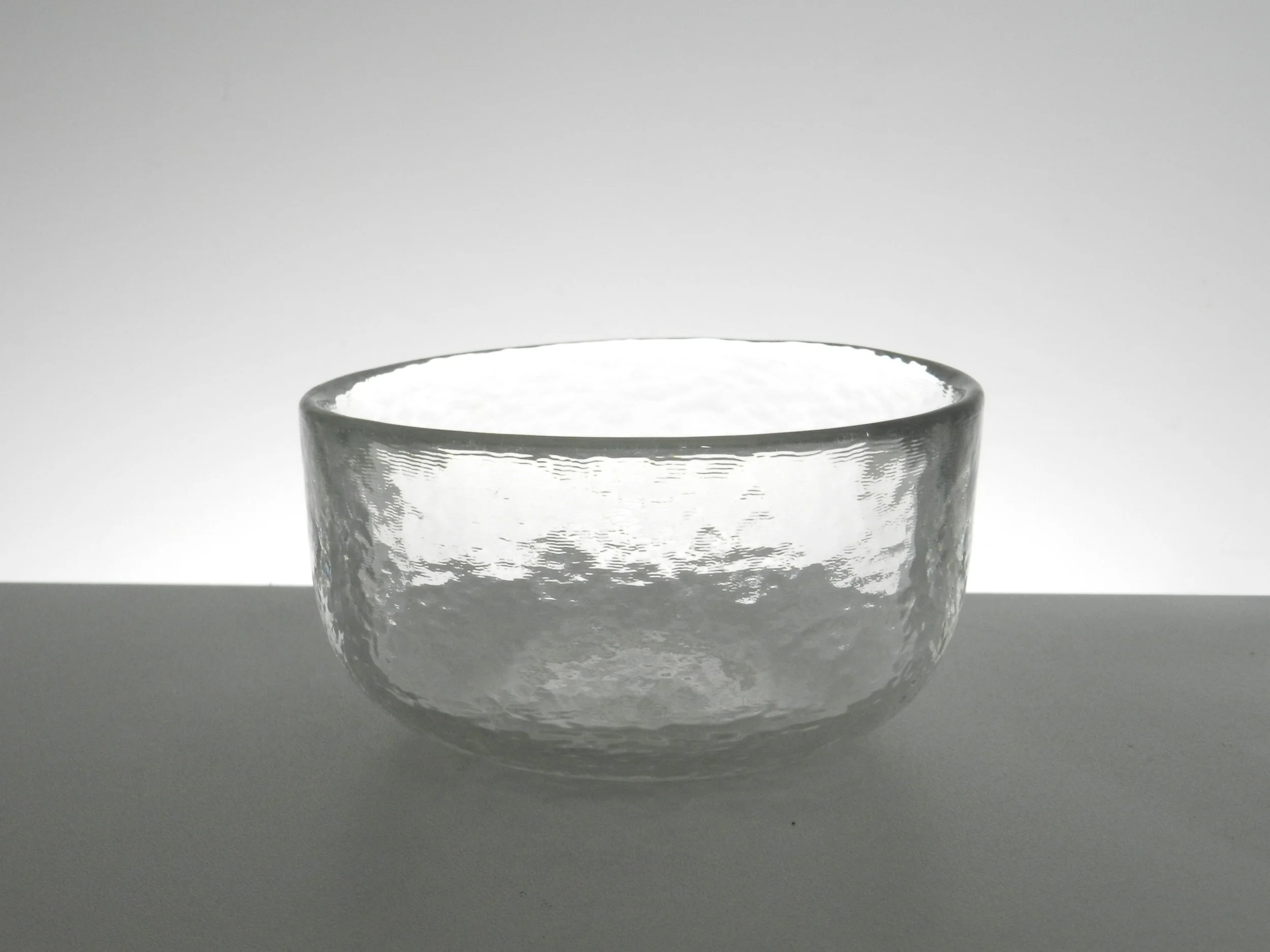 Set of 8 textured glass bowls designed by Zsofia Kanyak for Rosenthal.  Germany, 1970s.