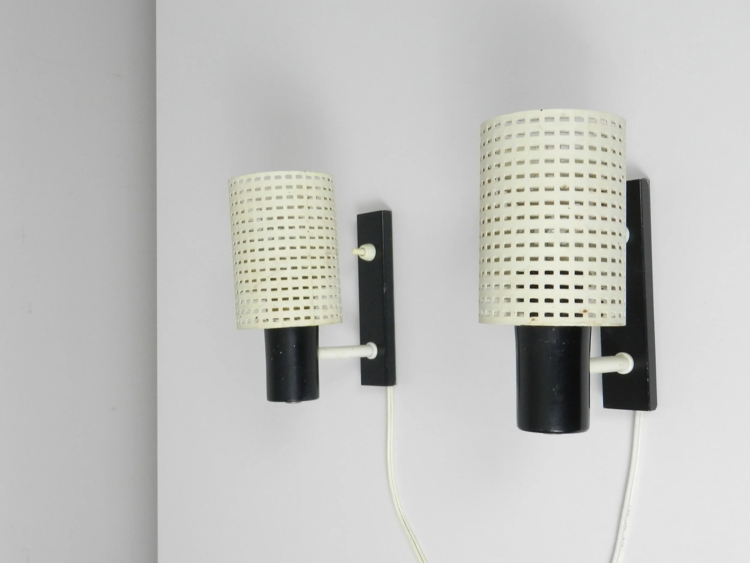 Pair of mid century modern wall lamps by Hala Zeist.  Netherlands, 1960s.