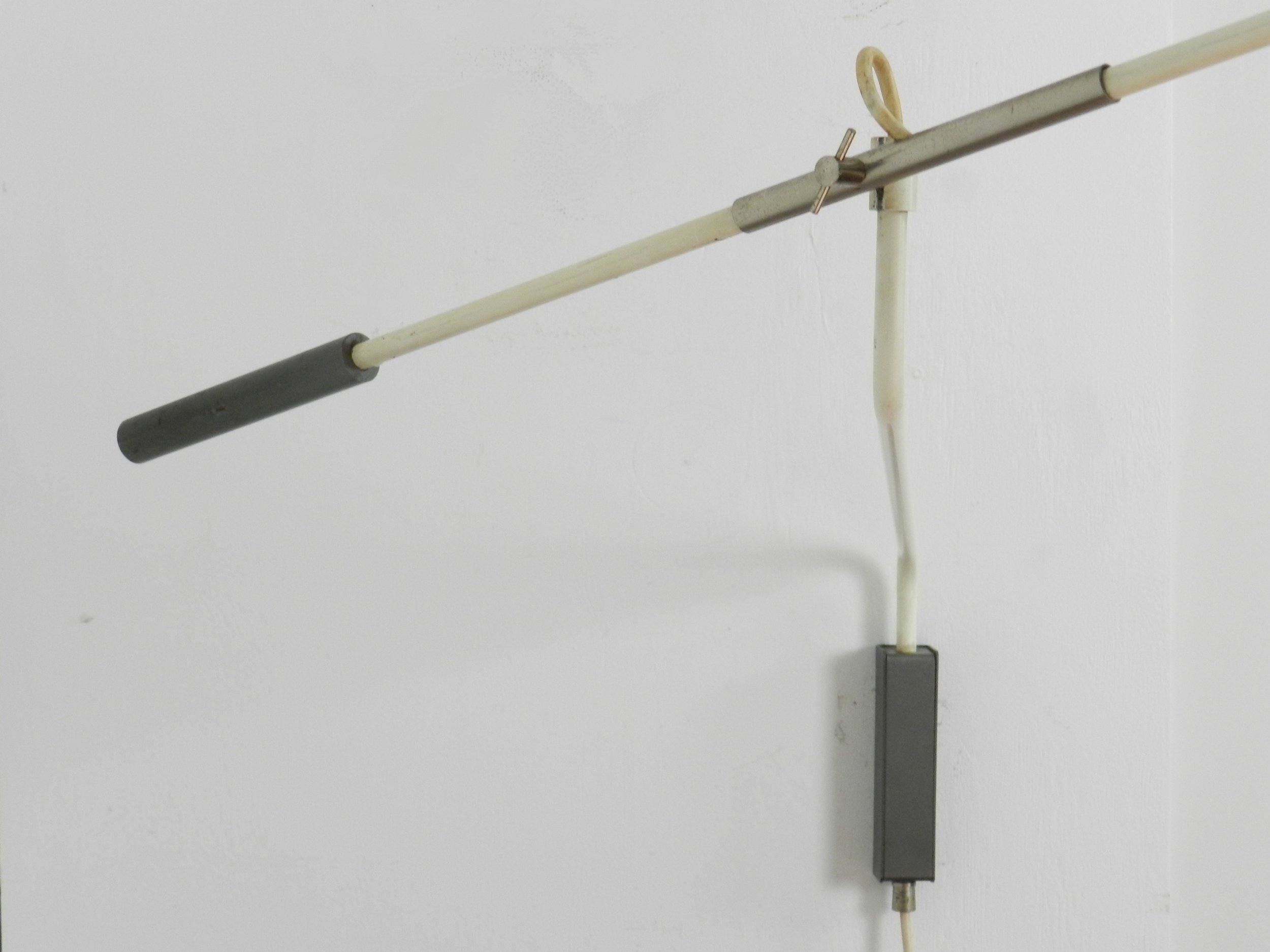Mid century modern articulating wall lamp designed by JJM Hoogervorst for Anvia.  Netherlands, 1950s.