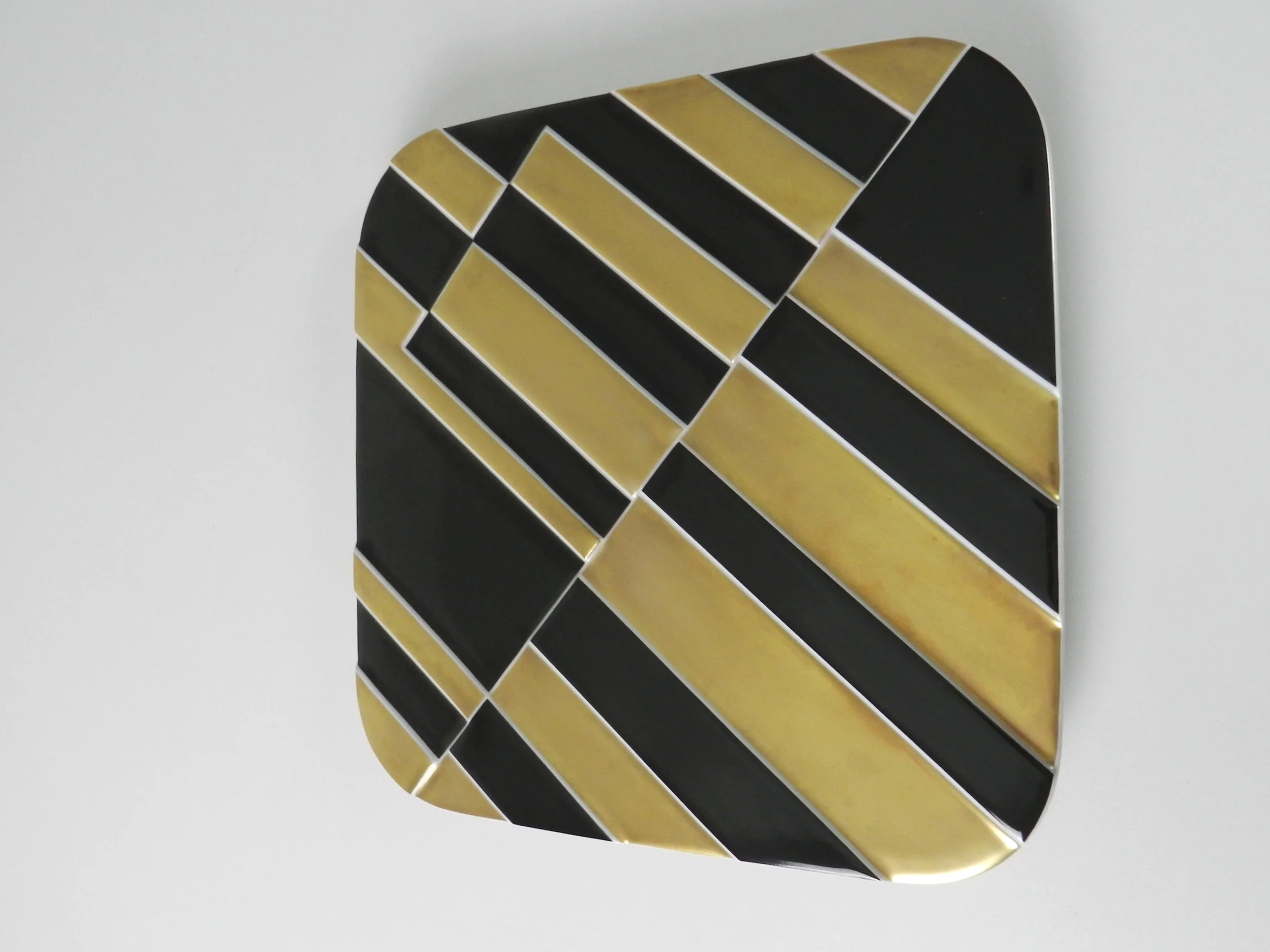 DPorcelain wall plaque / plate designed by Gunter Fruhtrunk for Rosenthal. Limited edition 128/3000.  Germany, 1974.