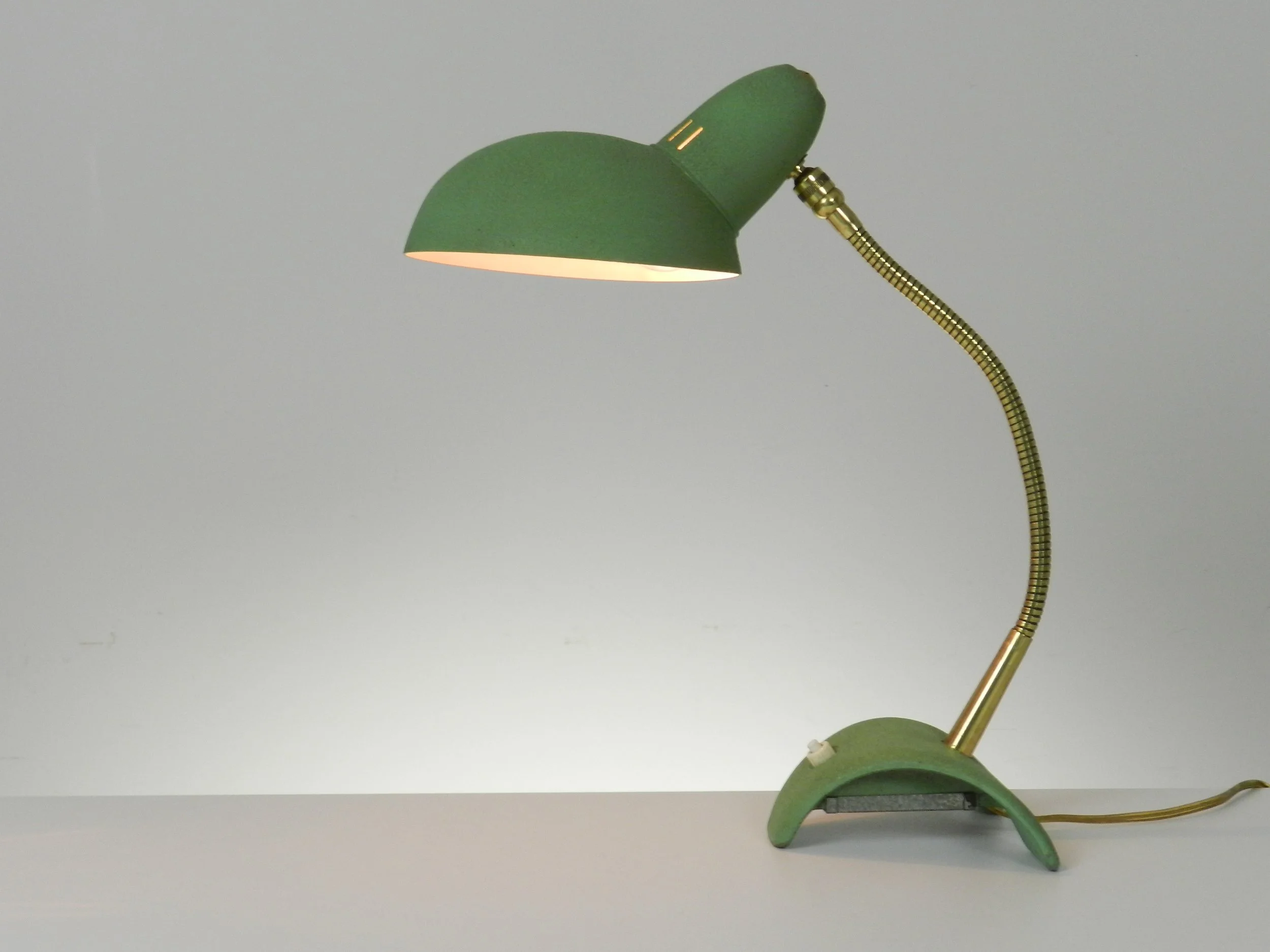 Mid century modern desk lamp in enameled metal and brass.  France, 1960s.