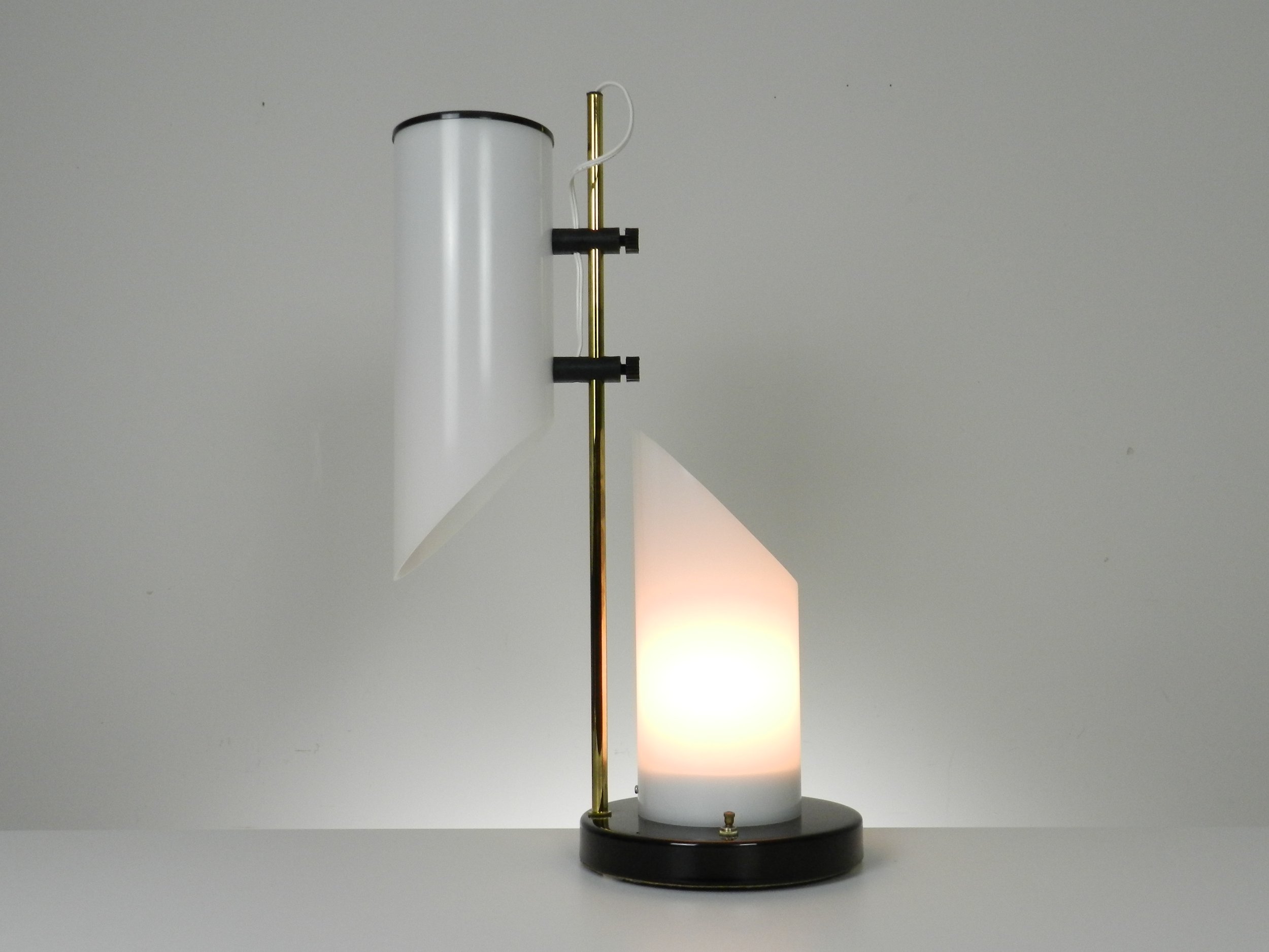 Vintage modern lamp in acrylic, brass and enameled metal.  circa 1970s.