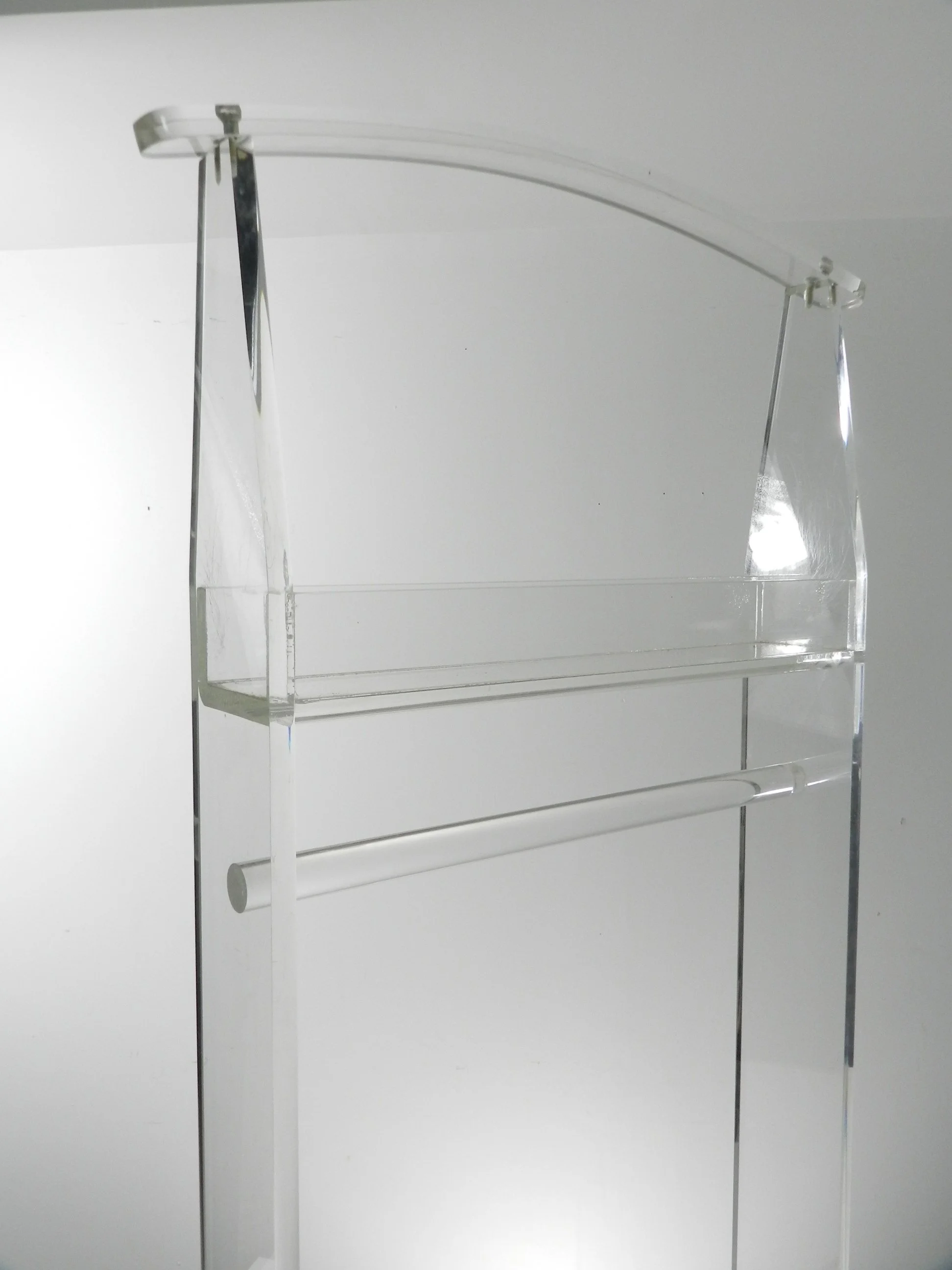 Vintage modernist valet in lucite.  circa 1980s.