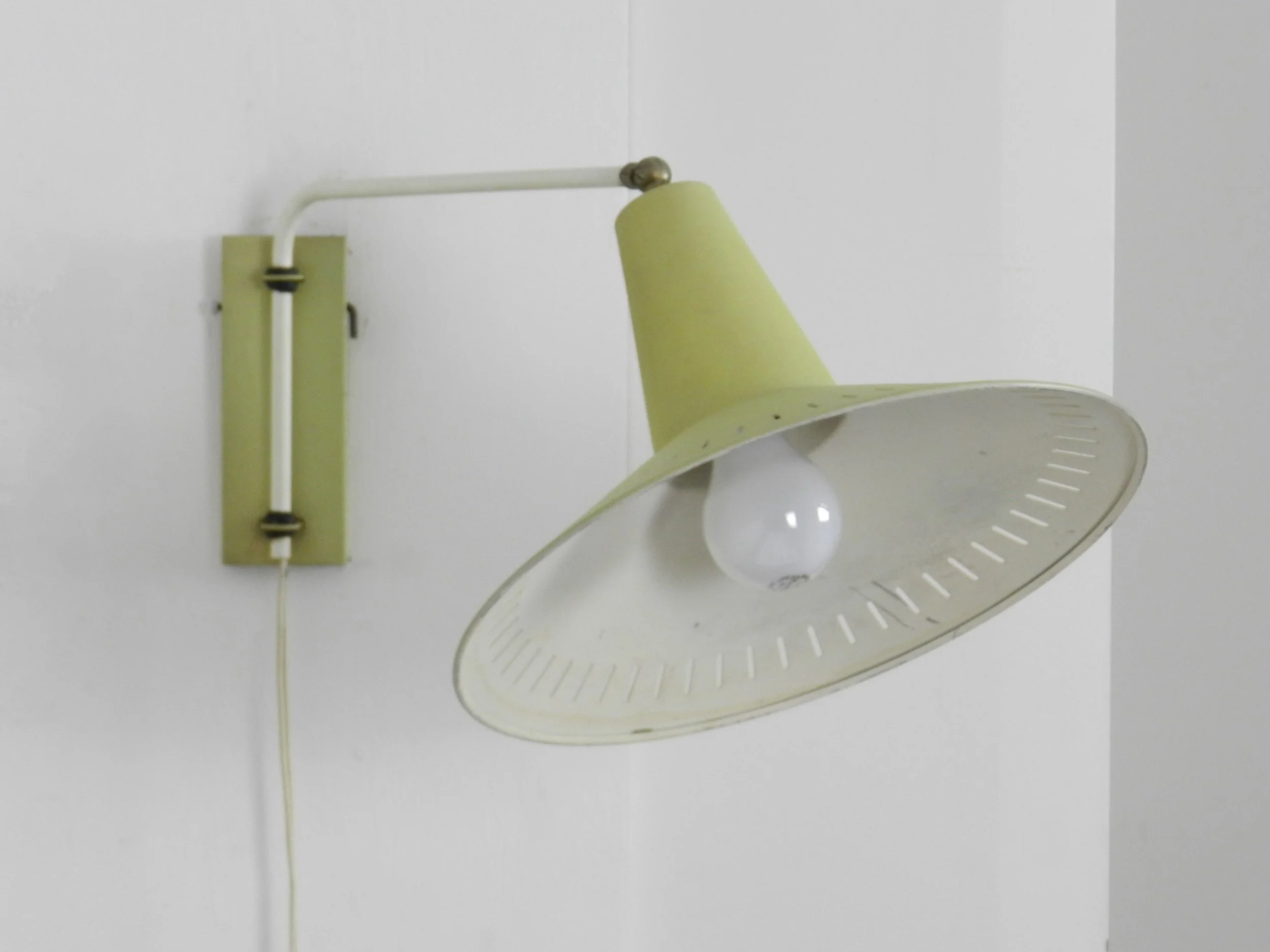 Mid century modern wall lamp attributed to Anvia.  Netherlands, 1950s.