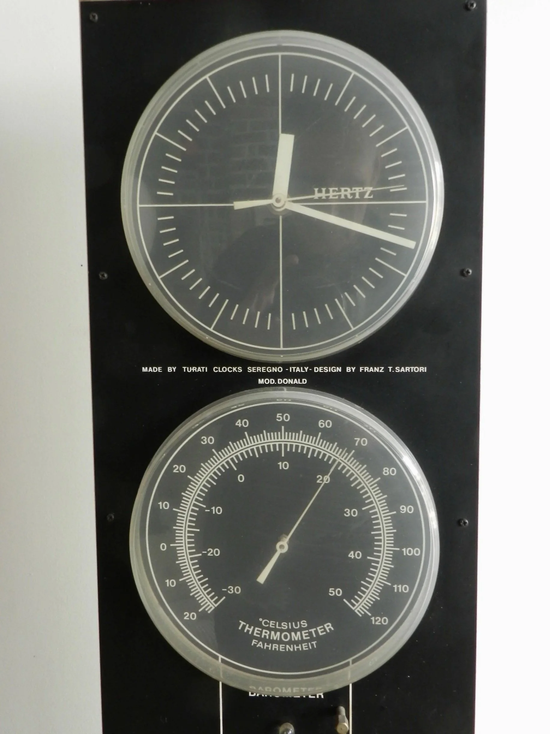Modernist floor clock, thermometer and barometer designed by Franz T. Sartori for Turati.  Italy, 1960s.