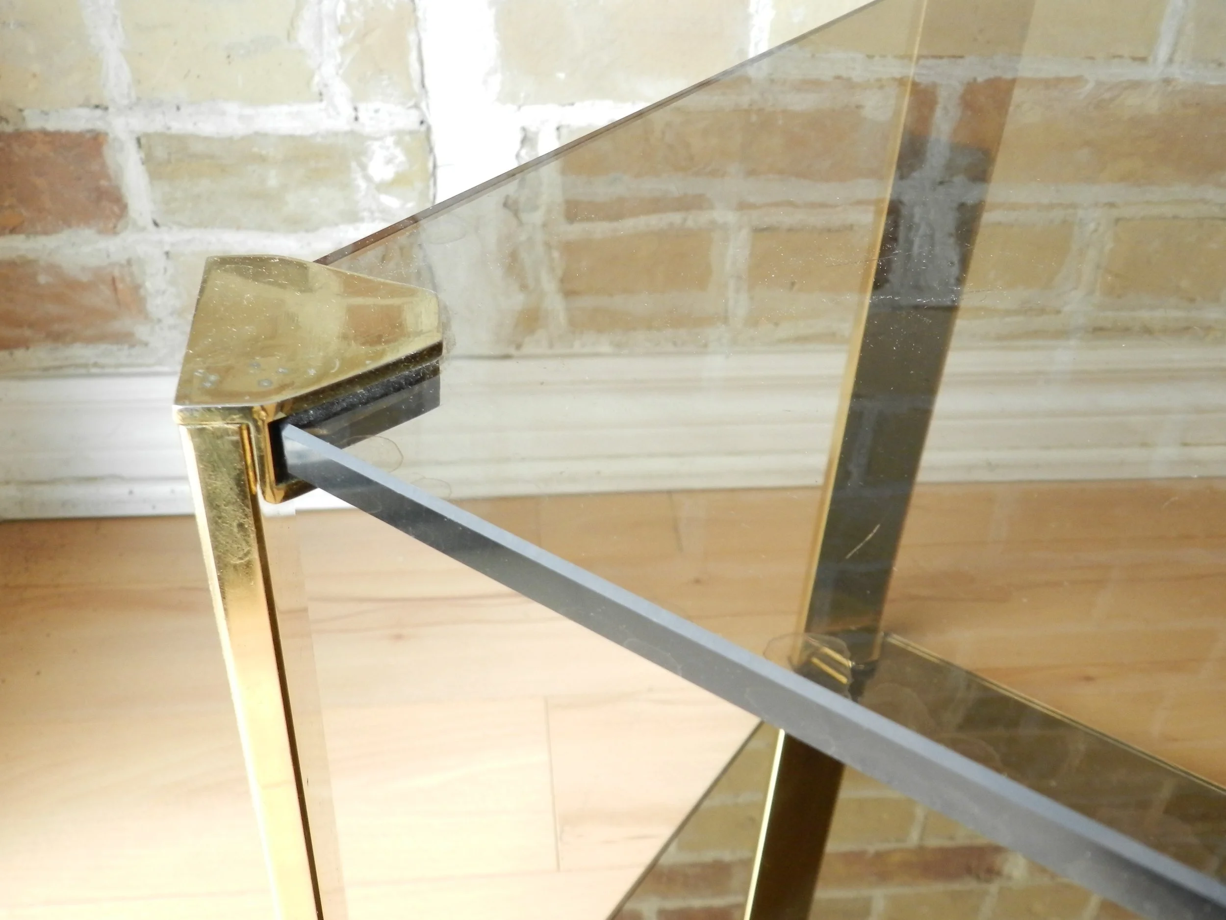 Compact coffee table in brass, tinted glass and tinted mirror by Cidue.  France, 1970s.