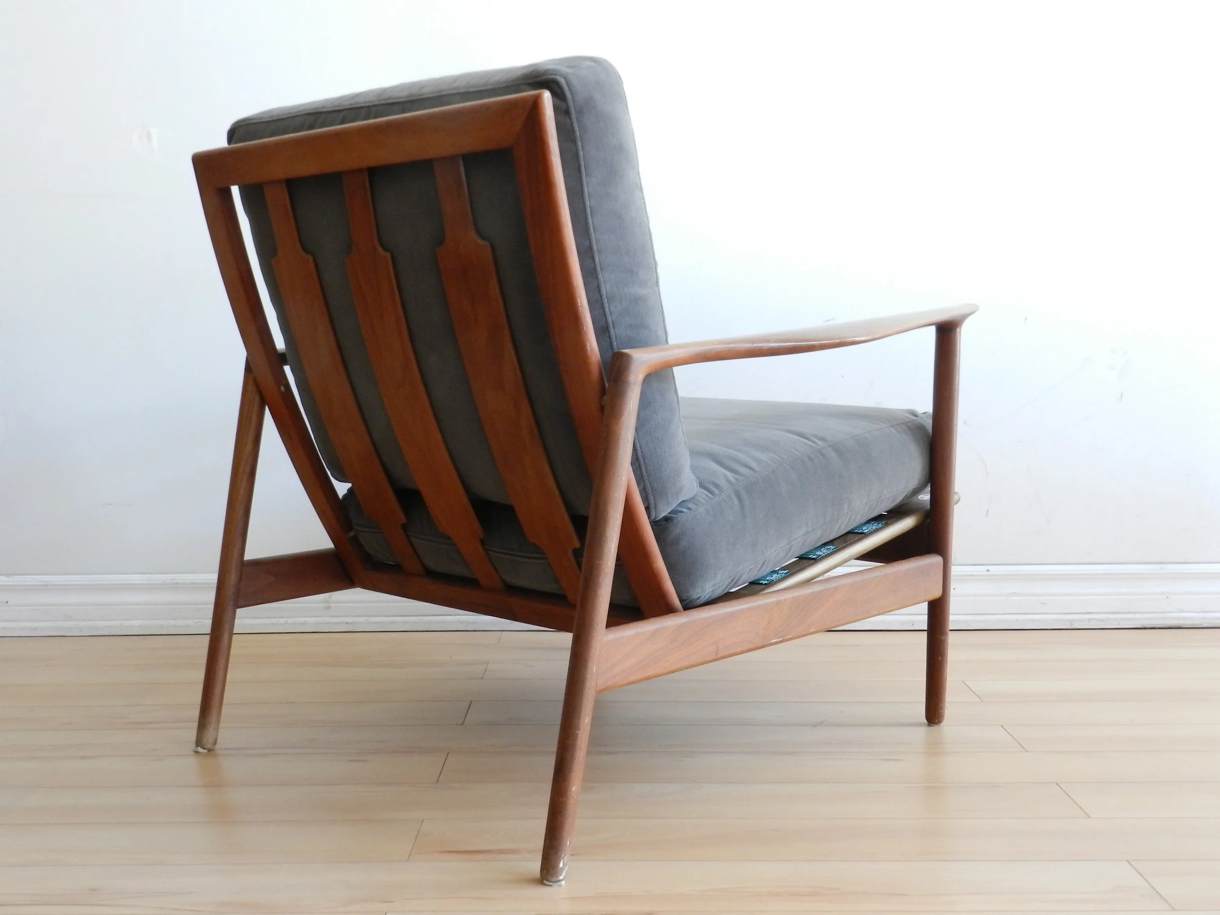 Teak lounge chair designed by Ib Kofod Larsen for Selig.  Denmark, 1960s.