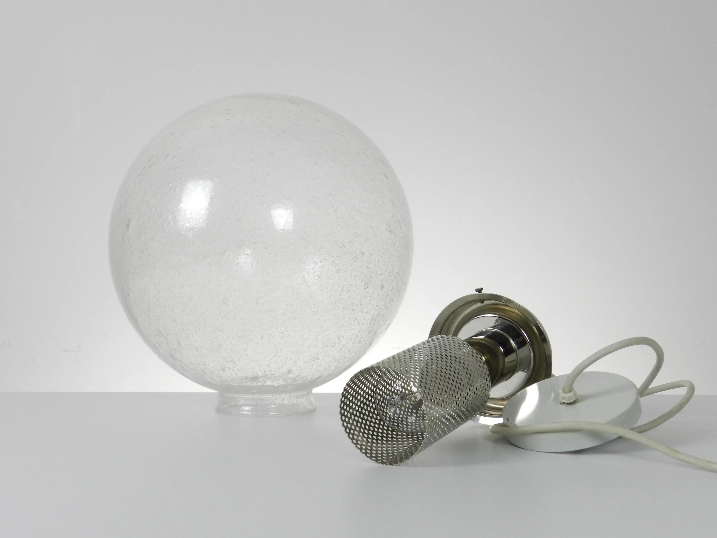 Vintage bubbble glass pendant with chrome hardware. Possibly by Lightolier.  circa 1970s
