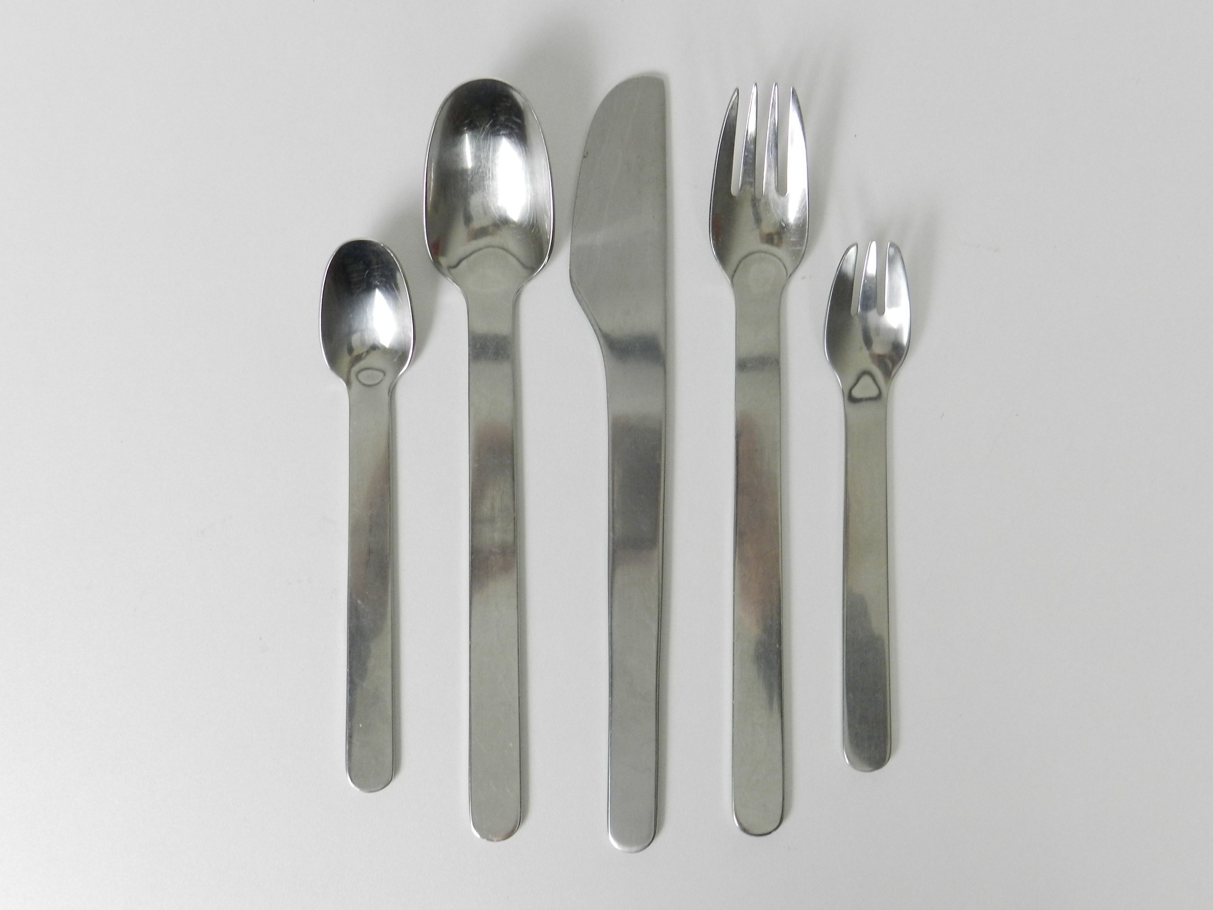 Stainless steel flatware designed by Louise Campbell for Georg Jensen, Denmark.