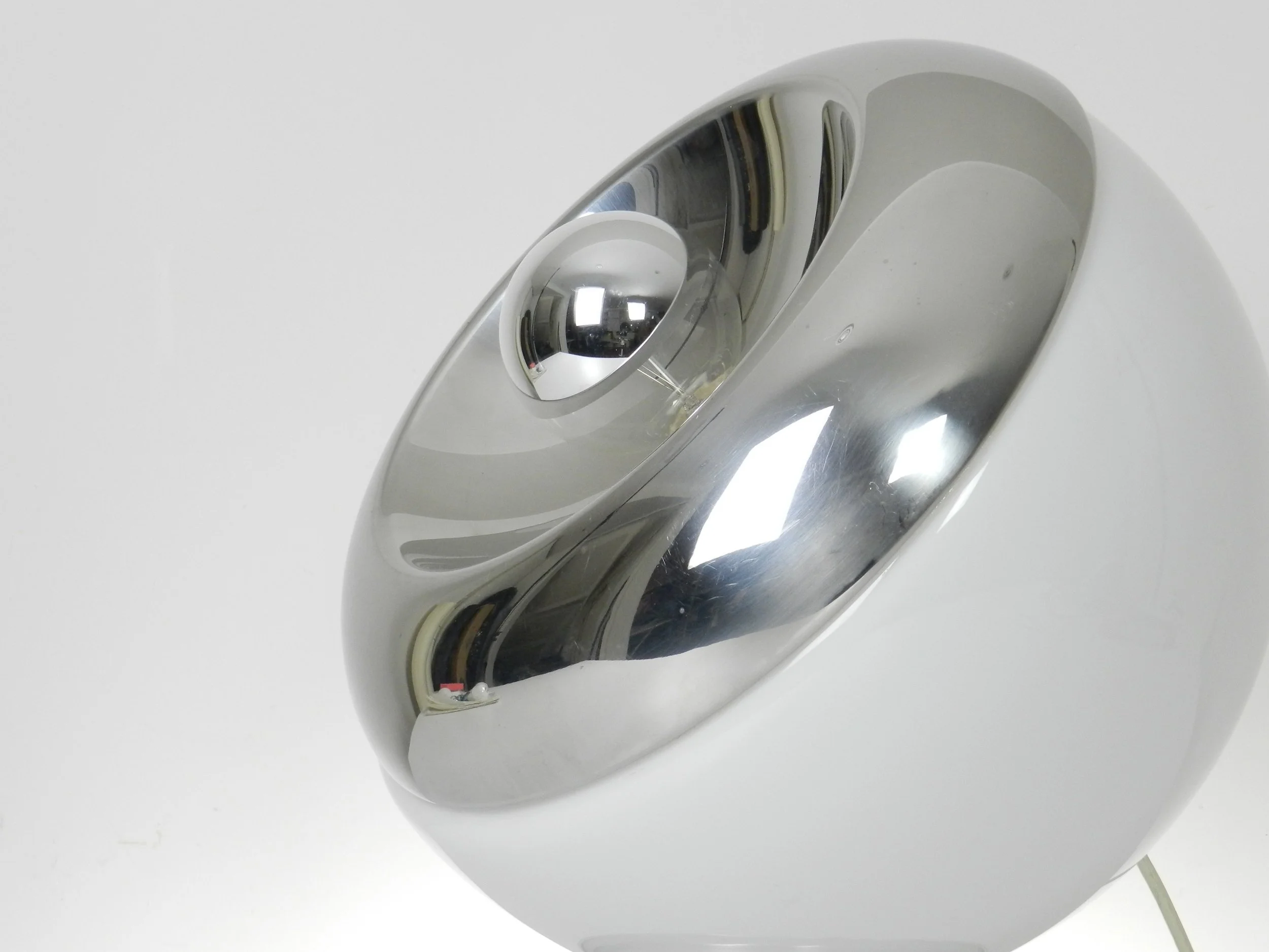 Large space age lamp in opaline glass and chrome by Reggiani. Can be used as a table or floor lamp.  Italy, 1970s.