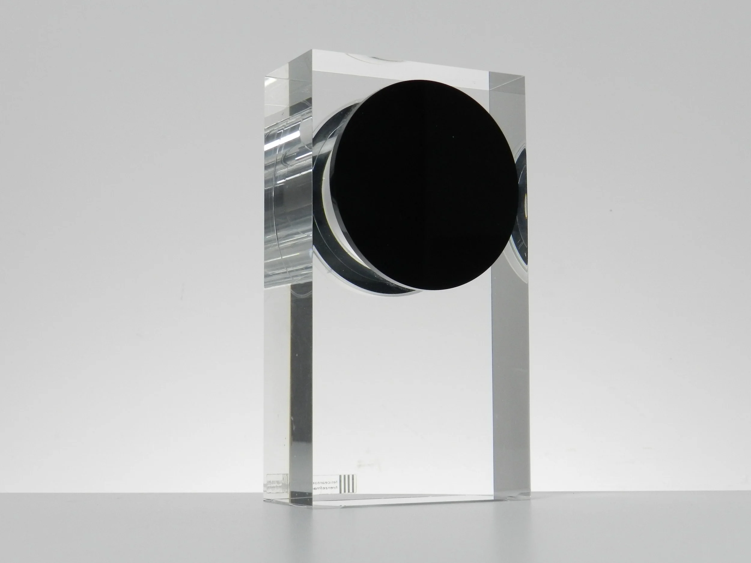 Modernist lucite clock designed by Felice Antonio Botta.  Italy, 1980s.