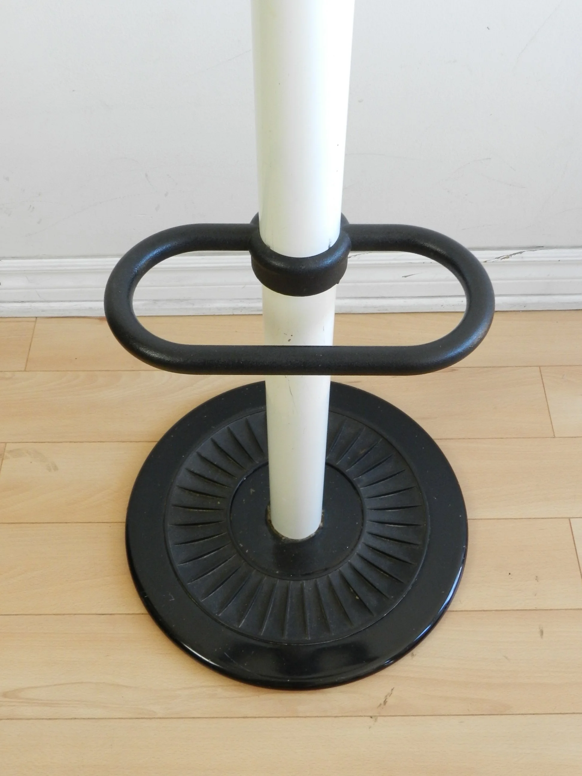 Post modern standing coat rack with umbrella holder. Designed by P. Segota for Luci.  Italy, 1980s.