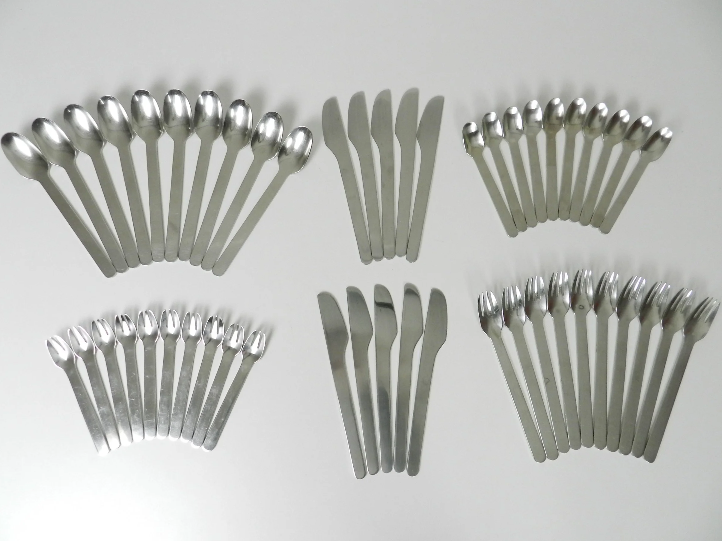 Stainless steel flatware designed by Louise Campbell for Georg Jensen, Denmark.