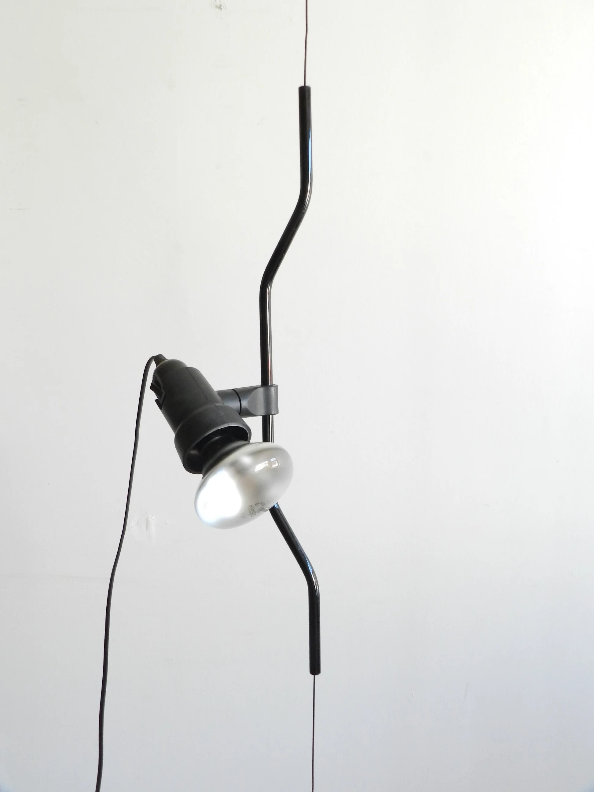 Modernist “Parentesi” floor to celing lamp designed by Achille Castiglioni and Pio Manzu for Flos.  Italy, 1970s.