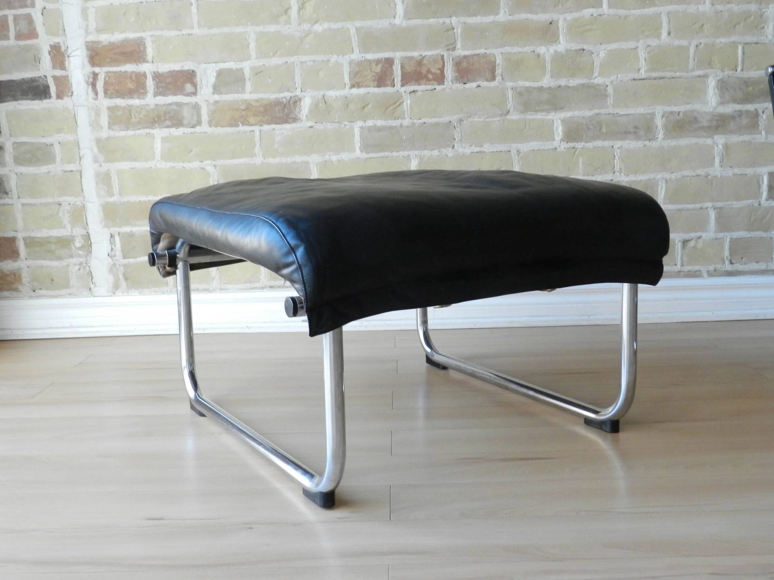 “Remmi” lounge chair and ottoman designed by Yrjo Kukkapuro for Avarte.  Finland, 1970s.