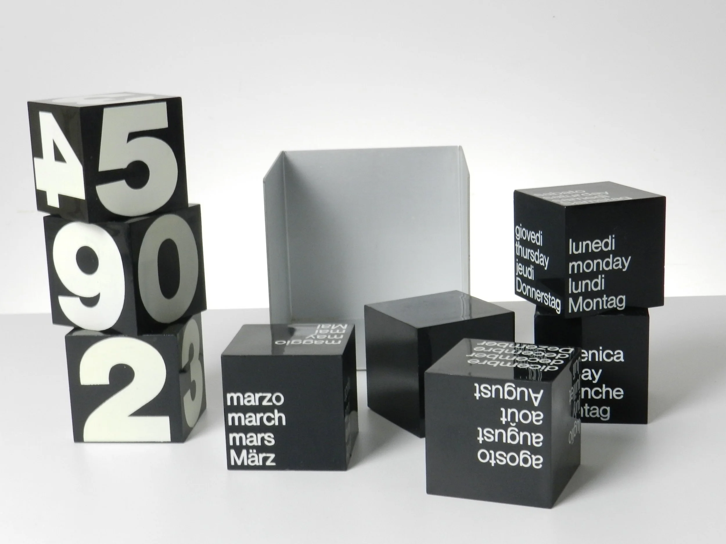 Rare modernist perpetual calendar by Gabbianelli. Aluminum case with plastic cubes.  Italy, 1970s.