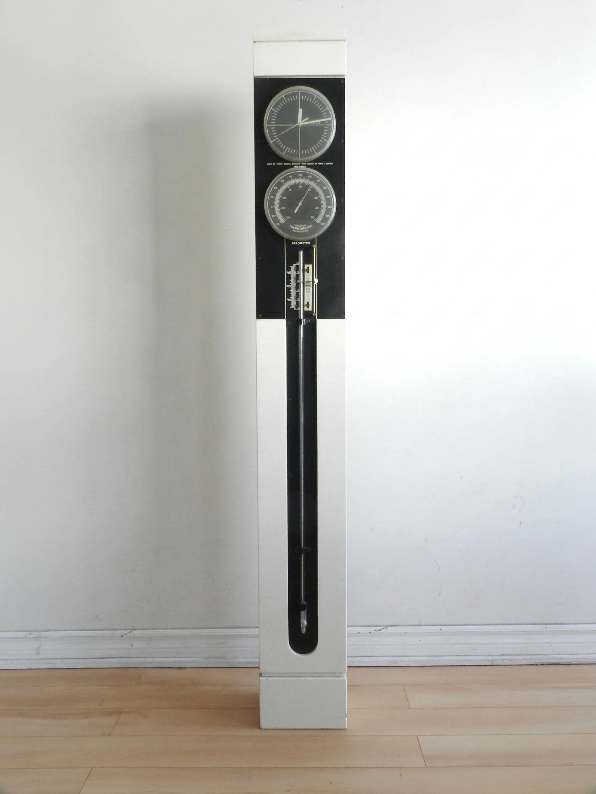 Modernist floor clock, thermometer and barometer designed by Franz T. Sartori for Turati.  Italy, 1960s.