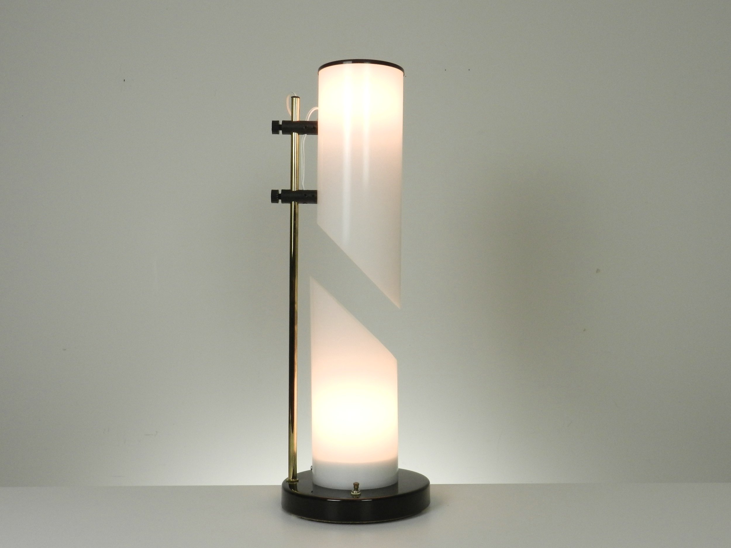 Vintage modern lamp in acrylic, brass and enameled metal. circa 1970s.