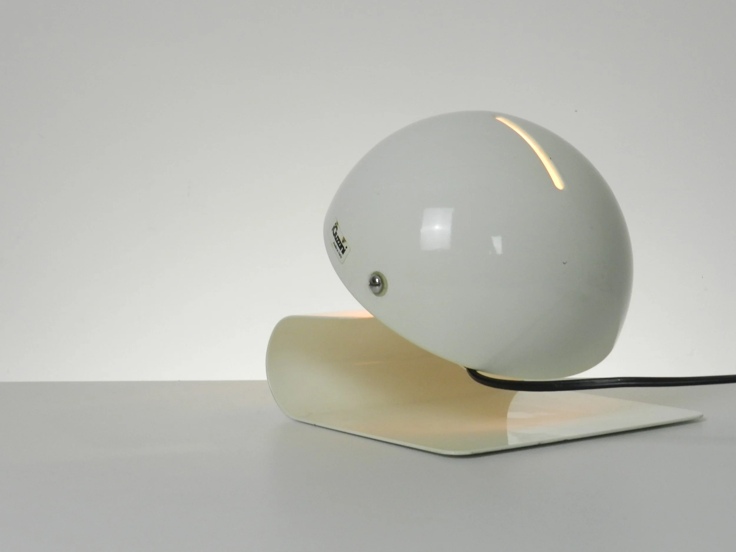 Space age Bugia lamp designed by Giuseppe Cormio for Guzzini.  In enameled metal with adjustable visors.  Italy, 1970s.