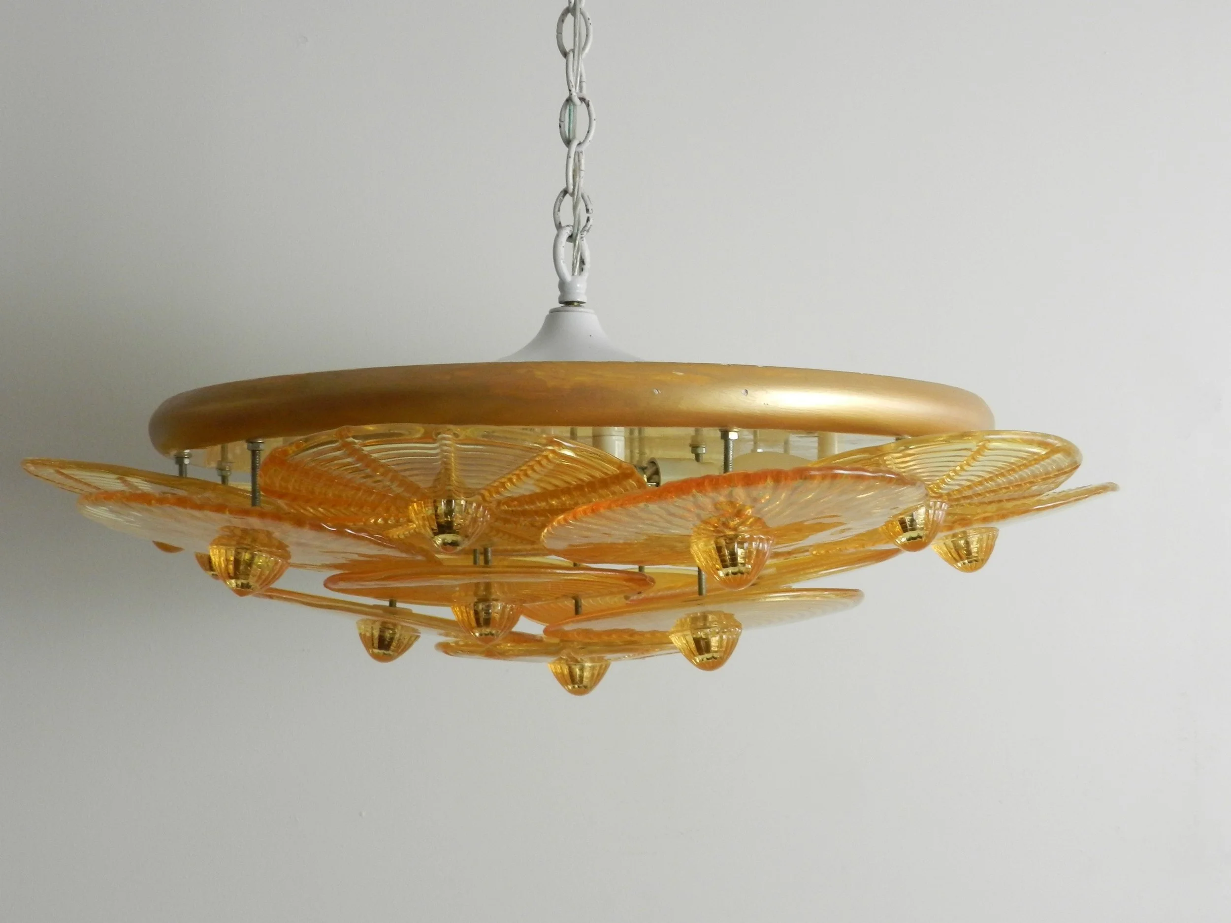 Large murano amber glass disc chandlier from Italy.