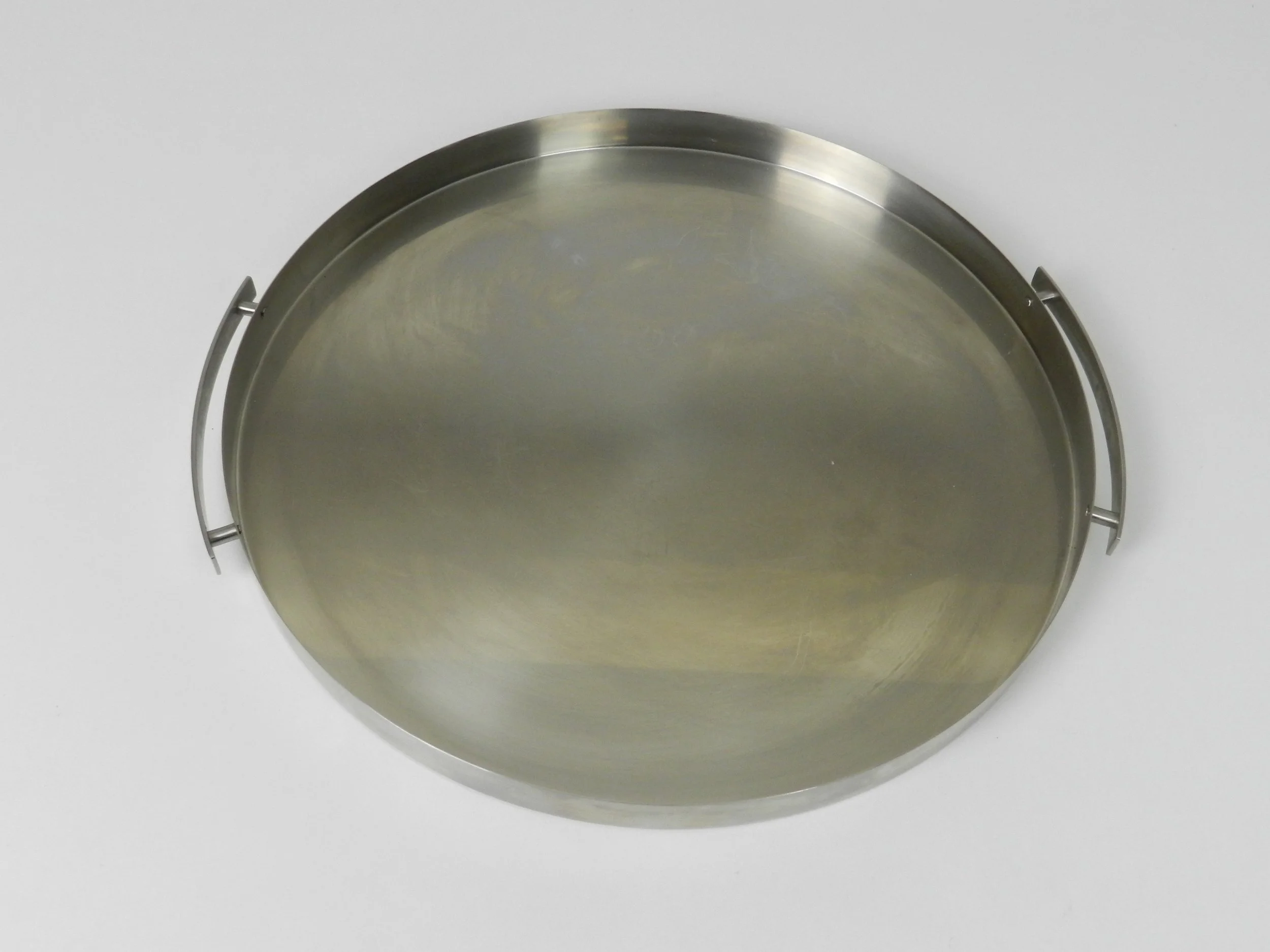 Stainless steel tray designed by Arne Jacobsen for Stelton.  Denmark, 1960s.