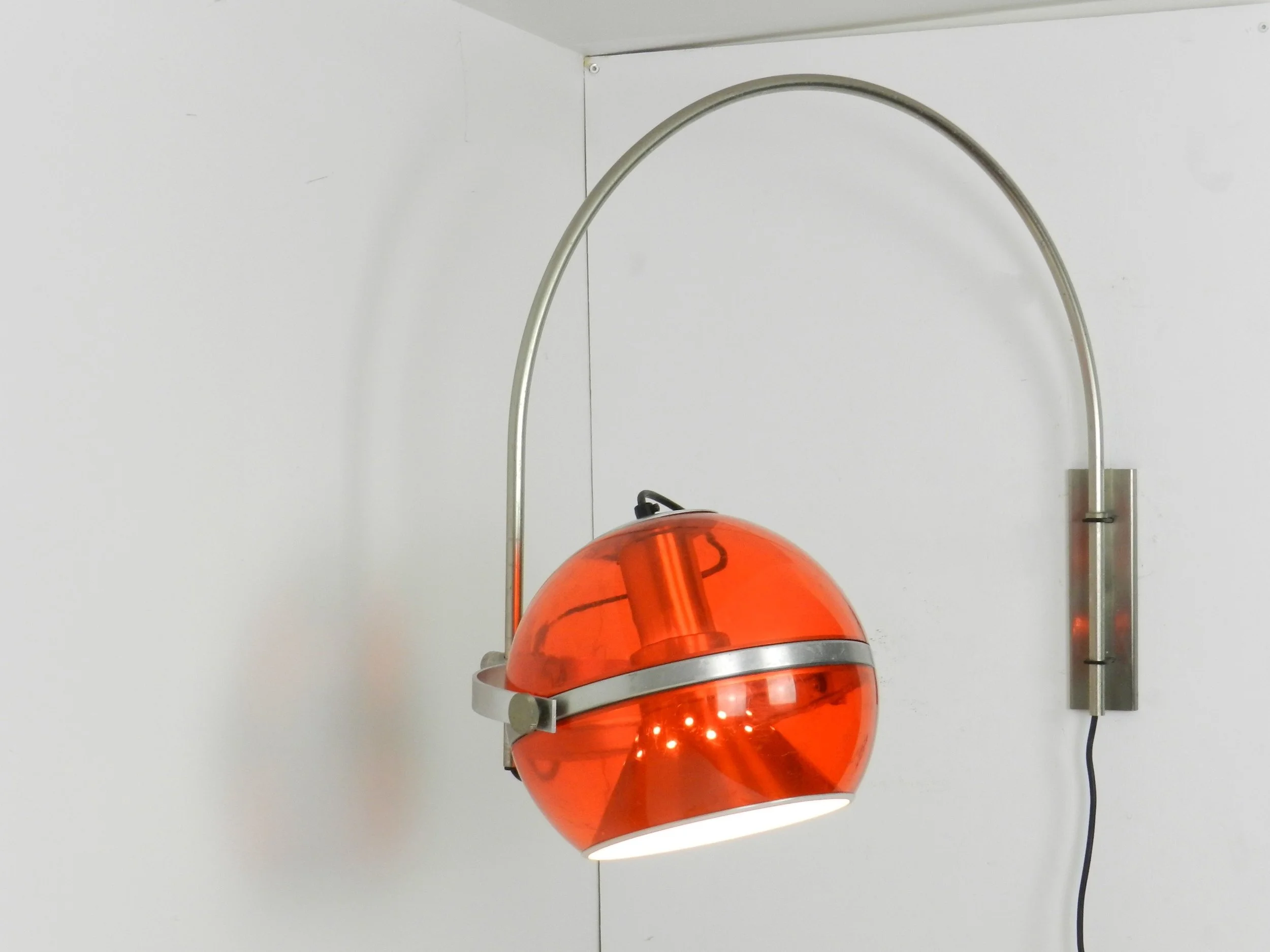 Space age arc wall lamp by Dijkstra.  Netherlands, 1970s