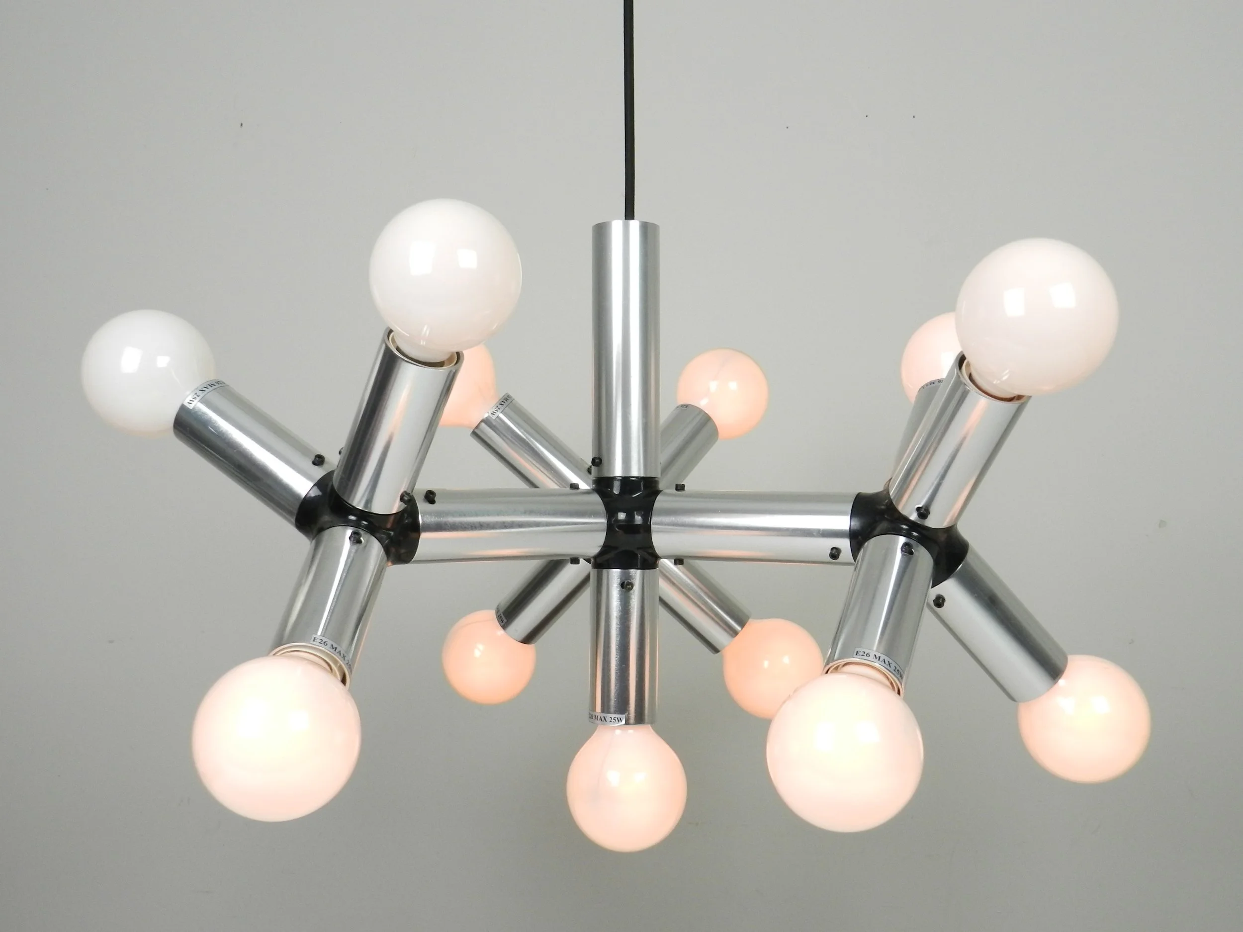 Chandelier in alumunum and plastic designed by Robert Haussmann for Swiss Lamps International.  Switzerland, 1960s.