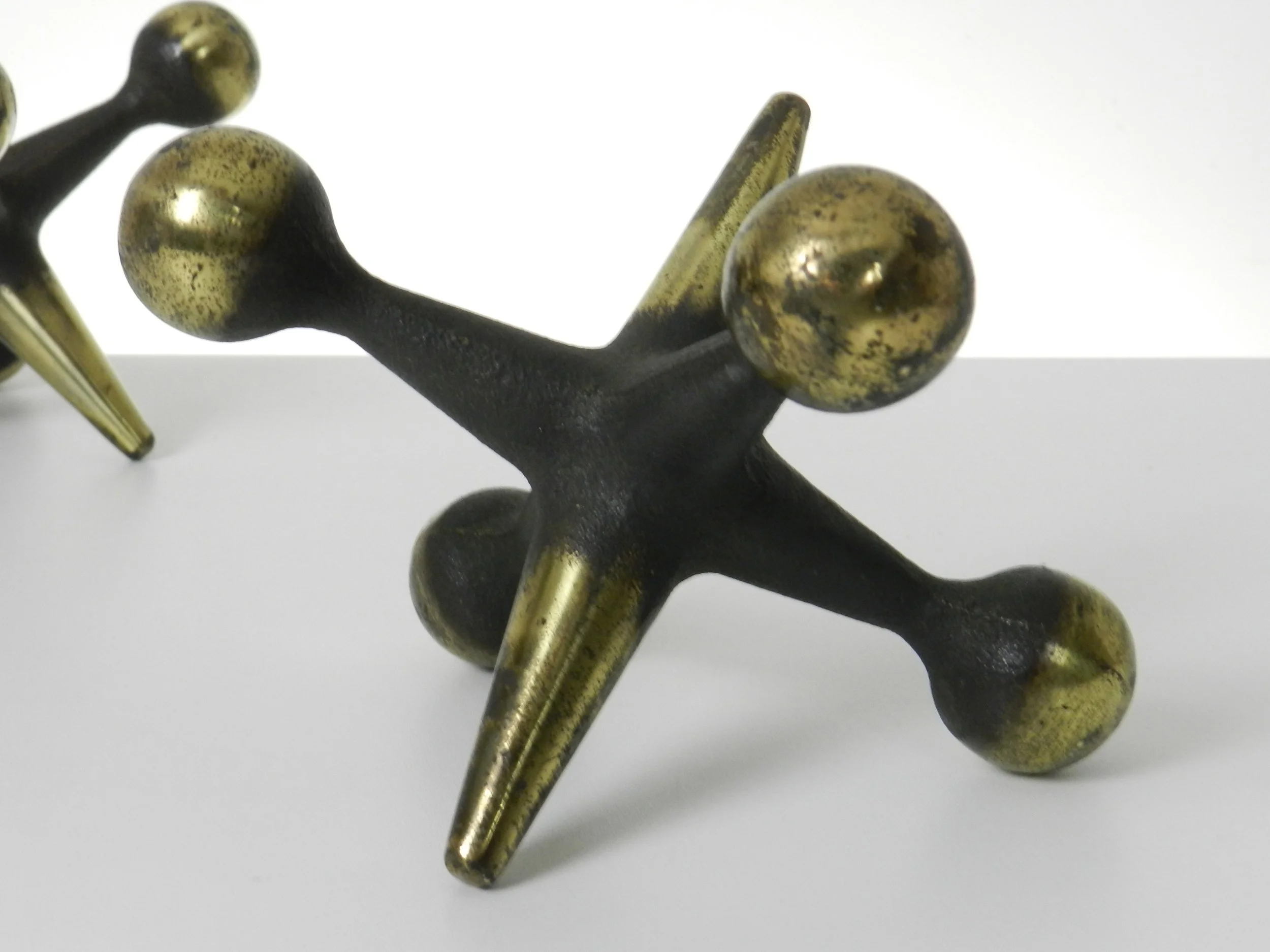 Pair of mid century cast iron bookends designed by Bill Curry for Design Line.  circa 1960s.