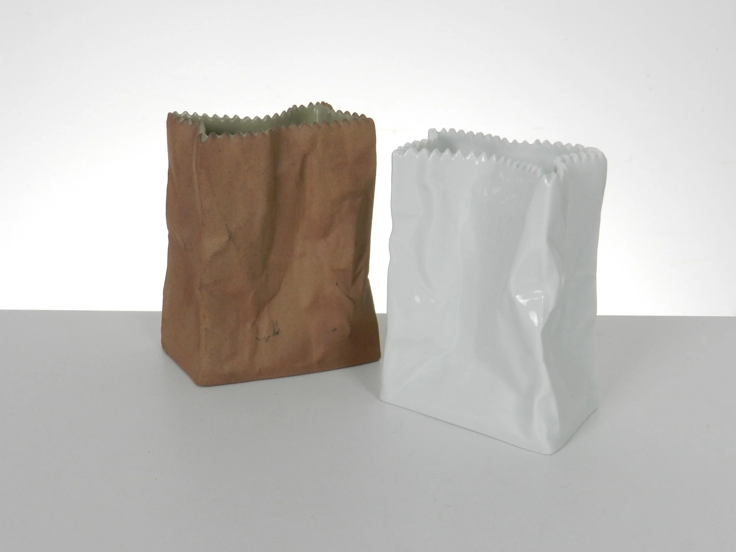 Small porcelain paper bag vases designed by Tapio Wirkkala for Rosenthal.  Germany, 1970s.