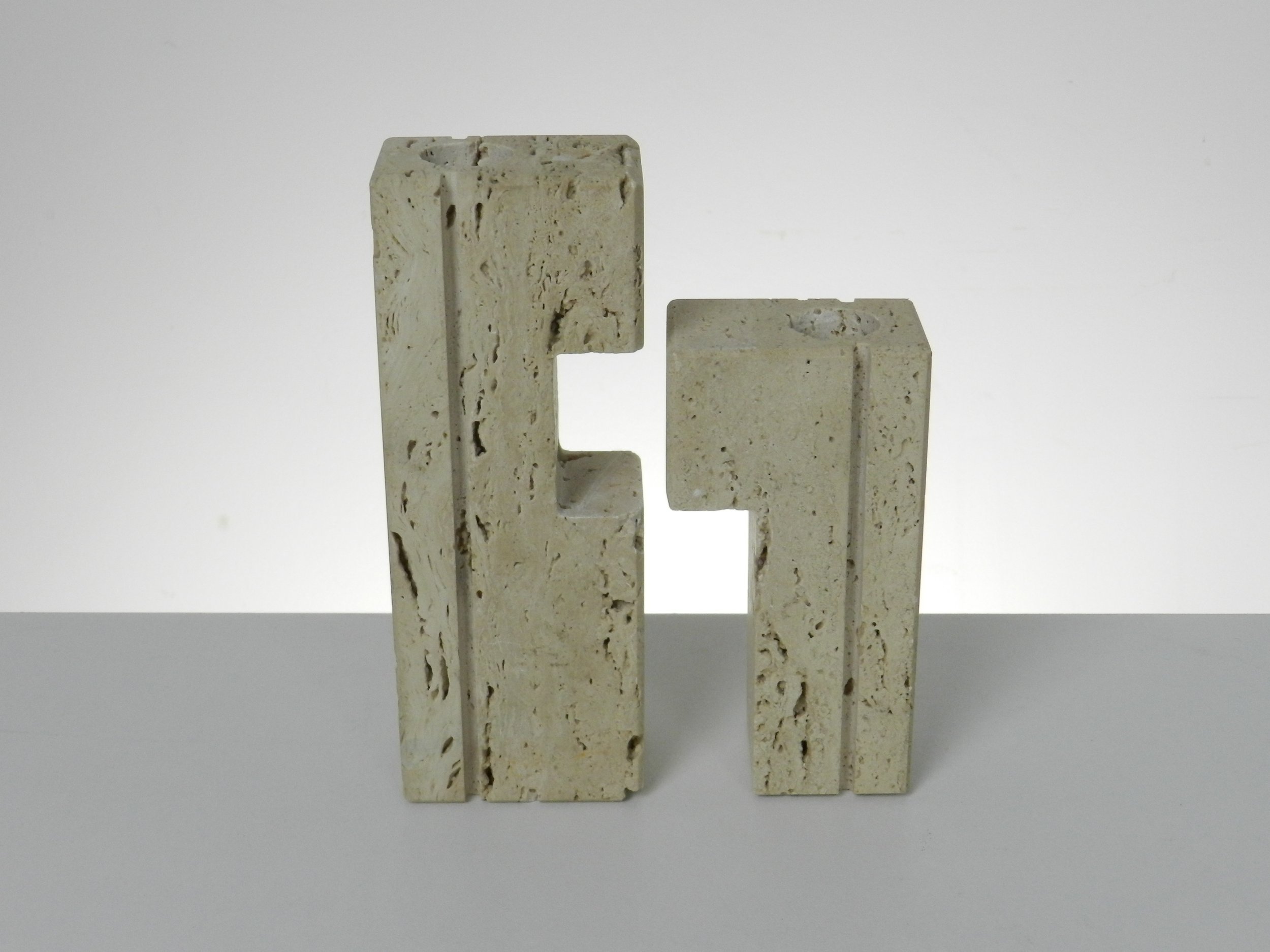 Travertine nesting candle holders designed by Fratelli Manelli.  Italy, 1960s.