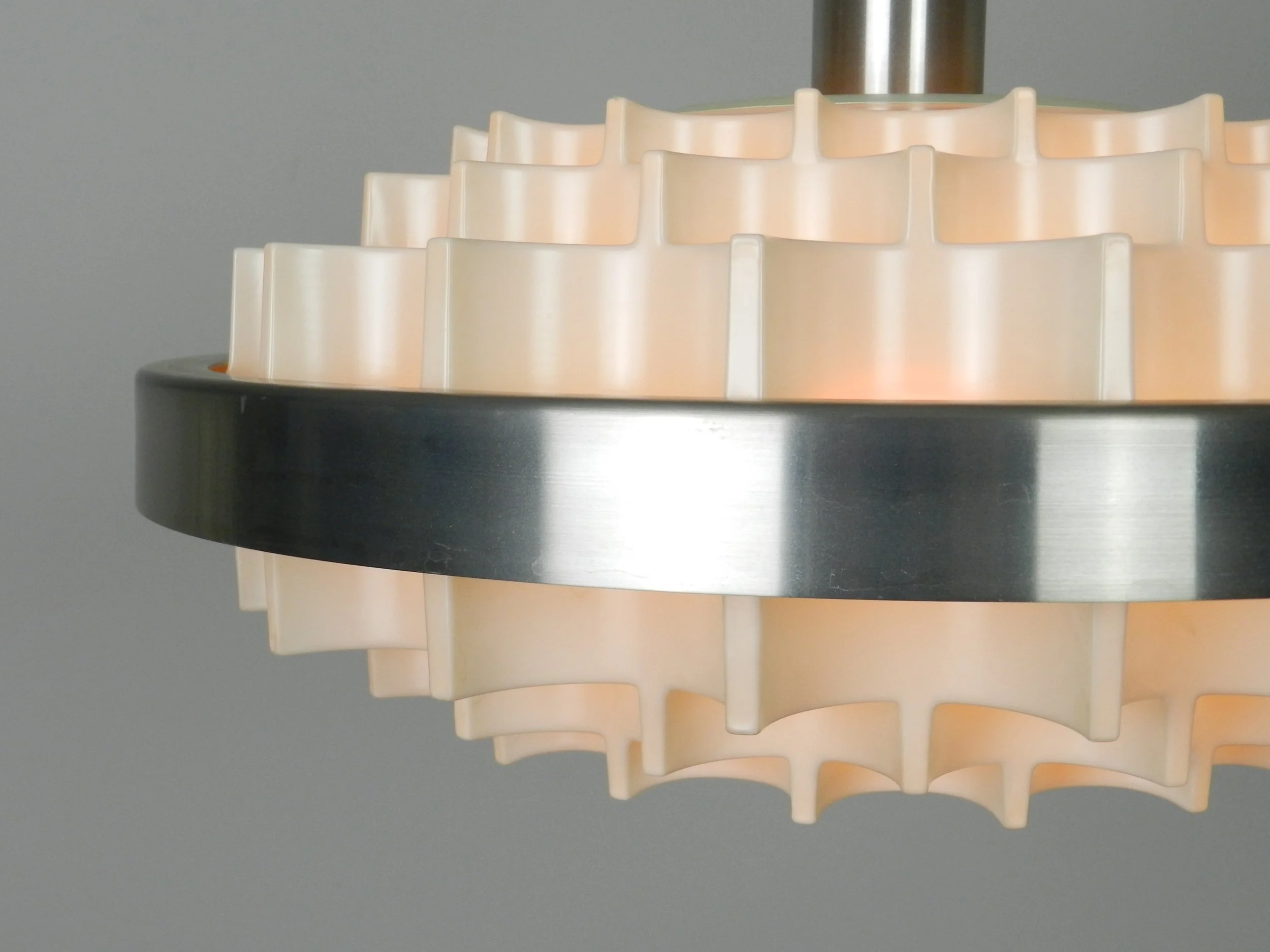 Mid century pendant lamp in plastic and aluminum. Attributed to Lars Schioler for Hoyrup.  Denmark, 1960s.