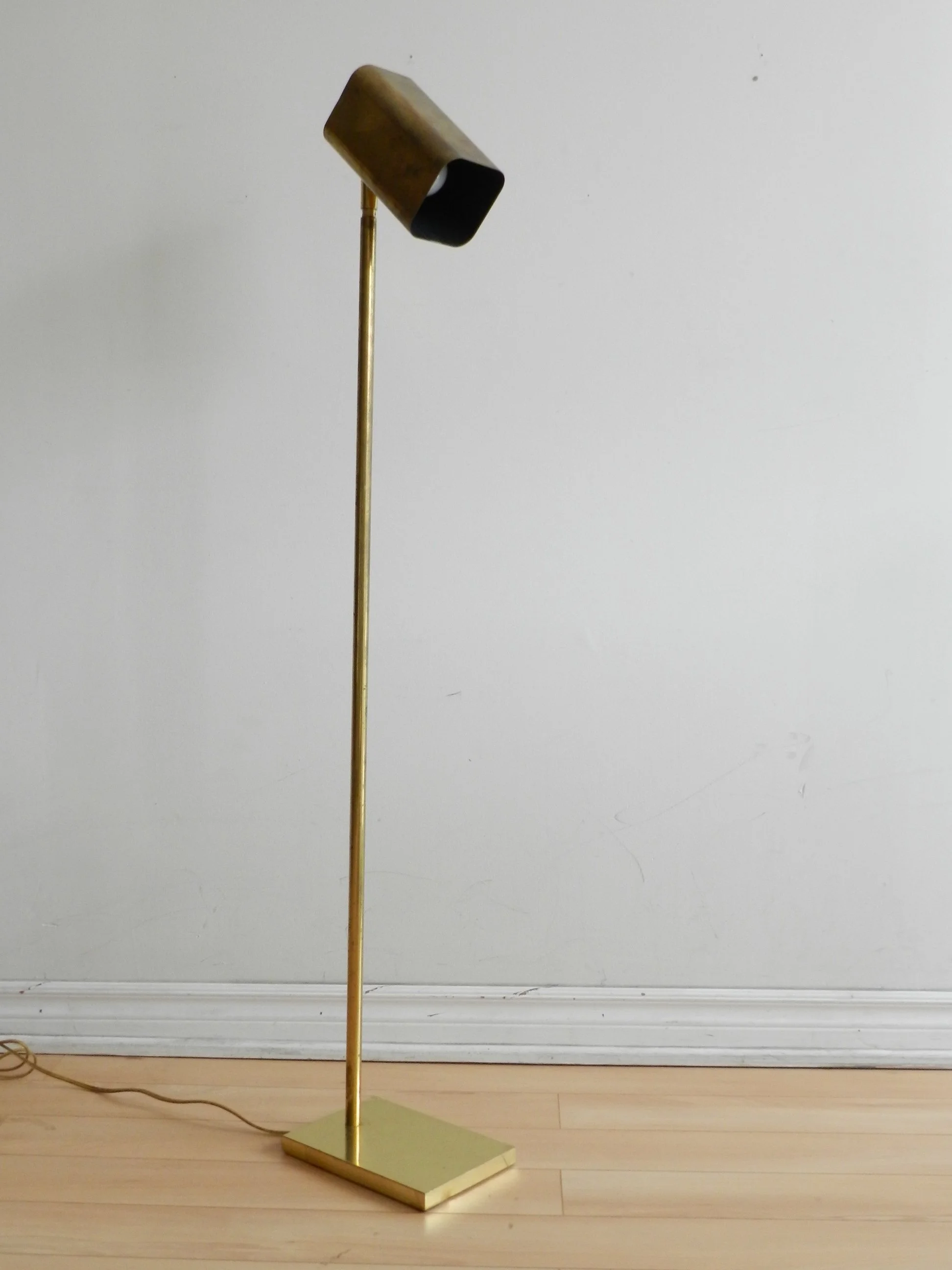 Modernist brass floor lamp in the style of Koch and Lowy.  USA, 1980s.