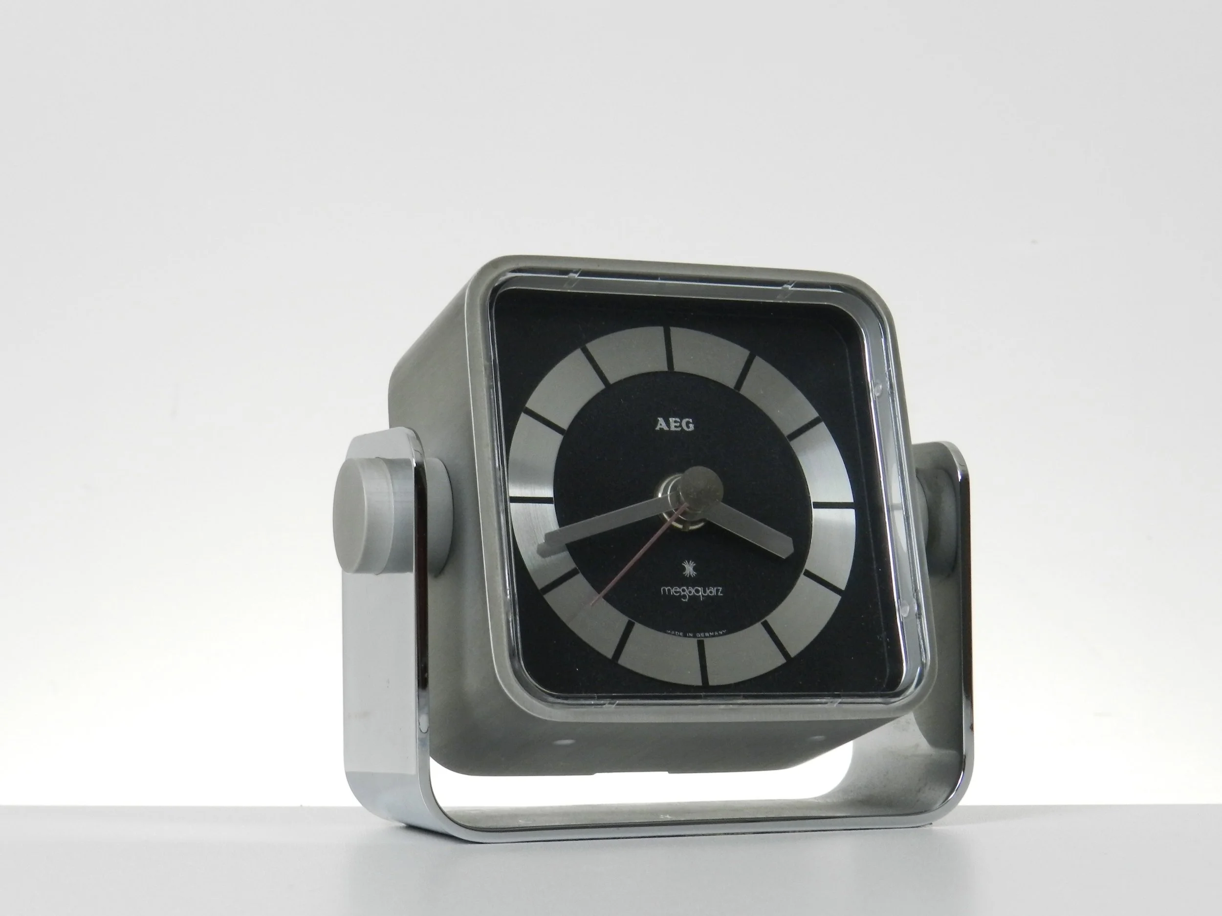 Modernist clock with steel case by AEG.  Germany, 1960s.
