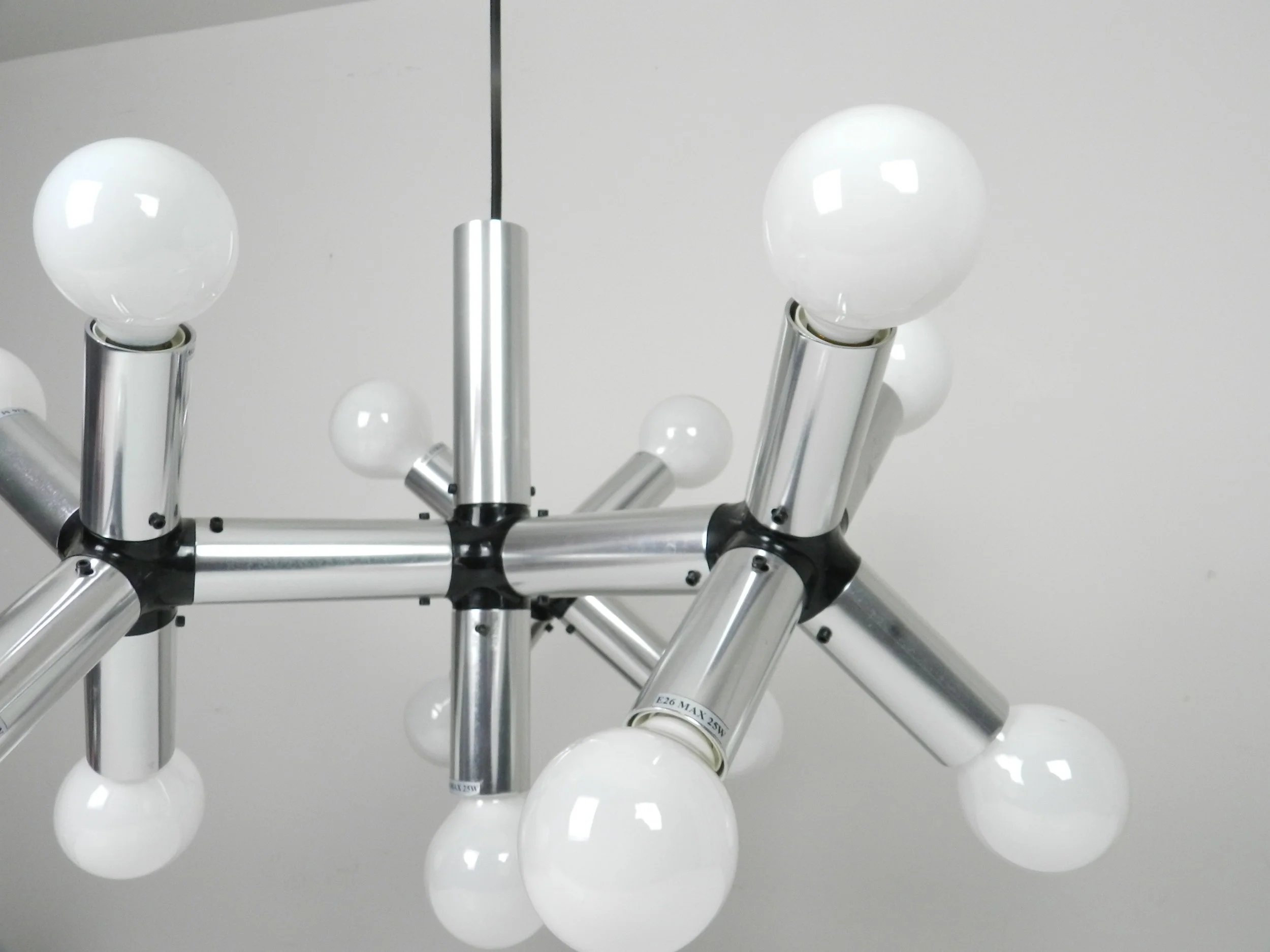 Chandelier in alumunum and plastic designed by Robert Haussmann for Swiss Lamps International.  Switzerland, 1960s.