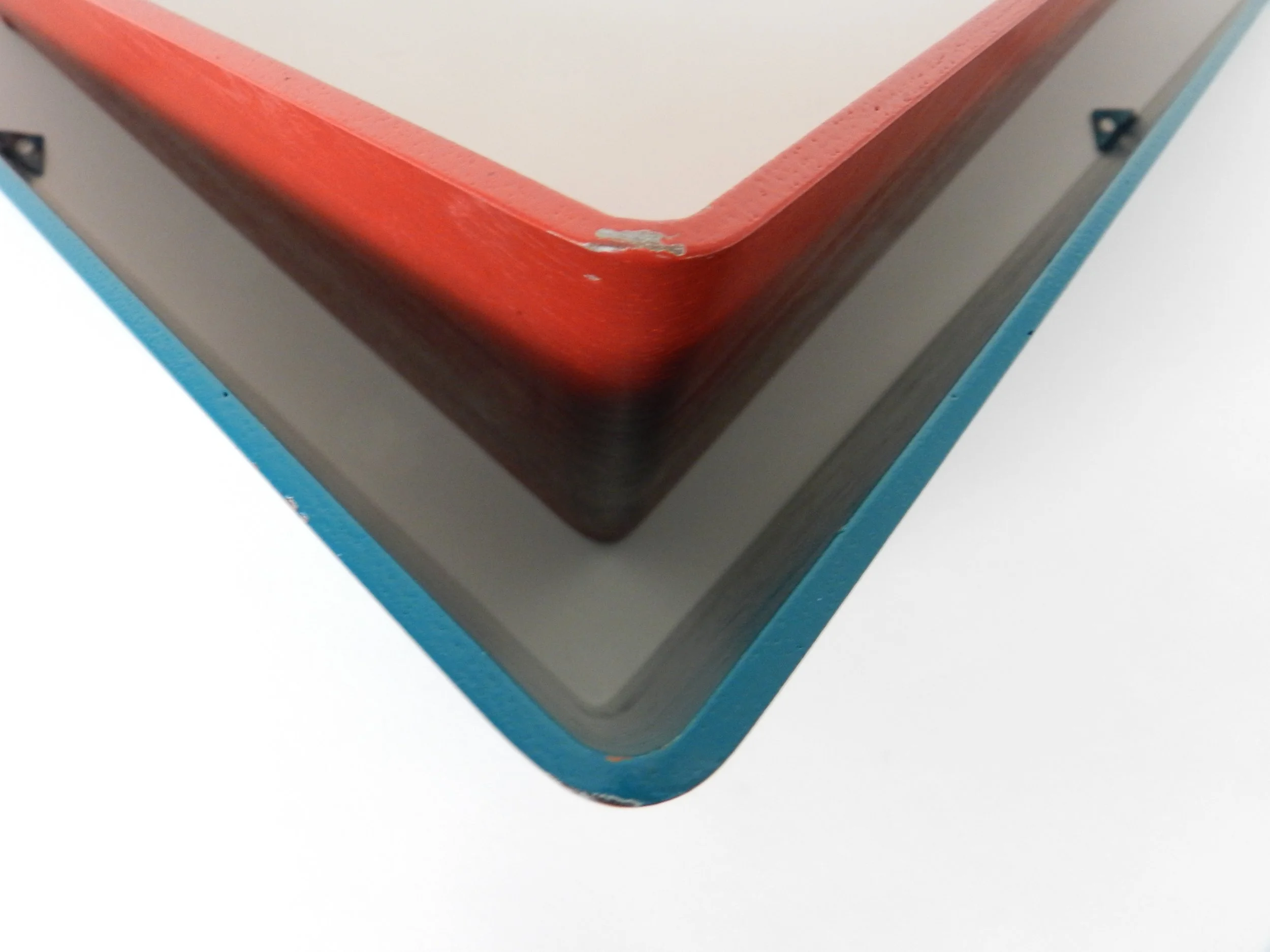 Pair of wall shelves in painted bent plywood, designed by Poul Cadovius.  Denmark, 1960s.