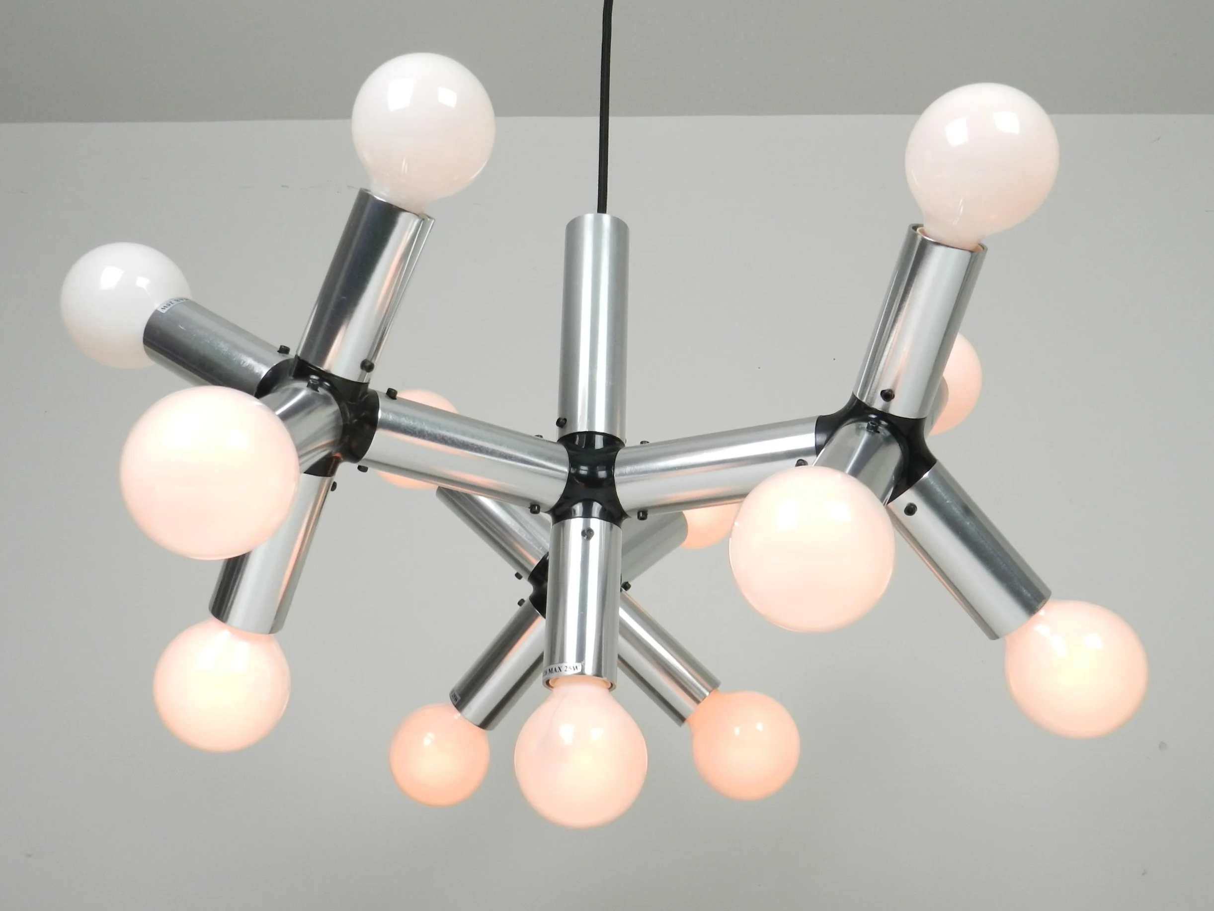 Chandelier in alumunum and plastic designed by Robert Haussmann for Swiss Lamps International.  Switzerland, 1960s.