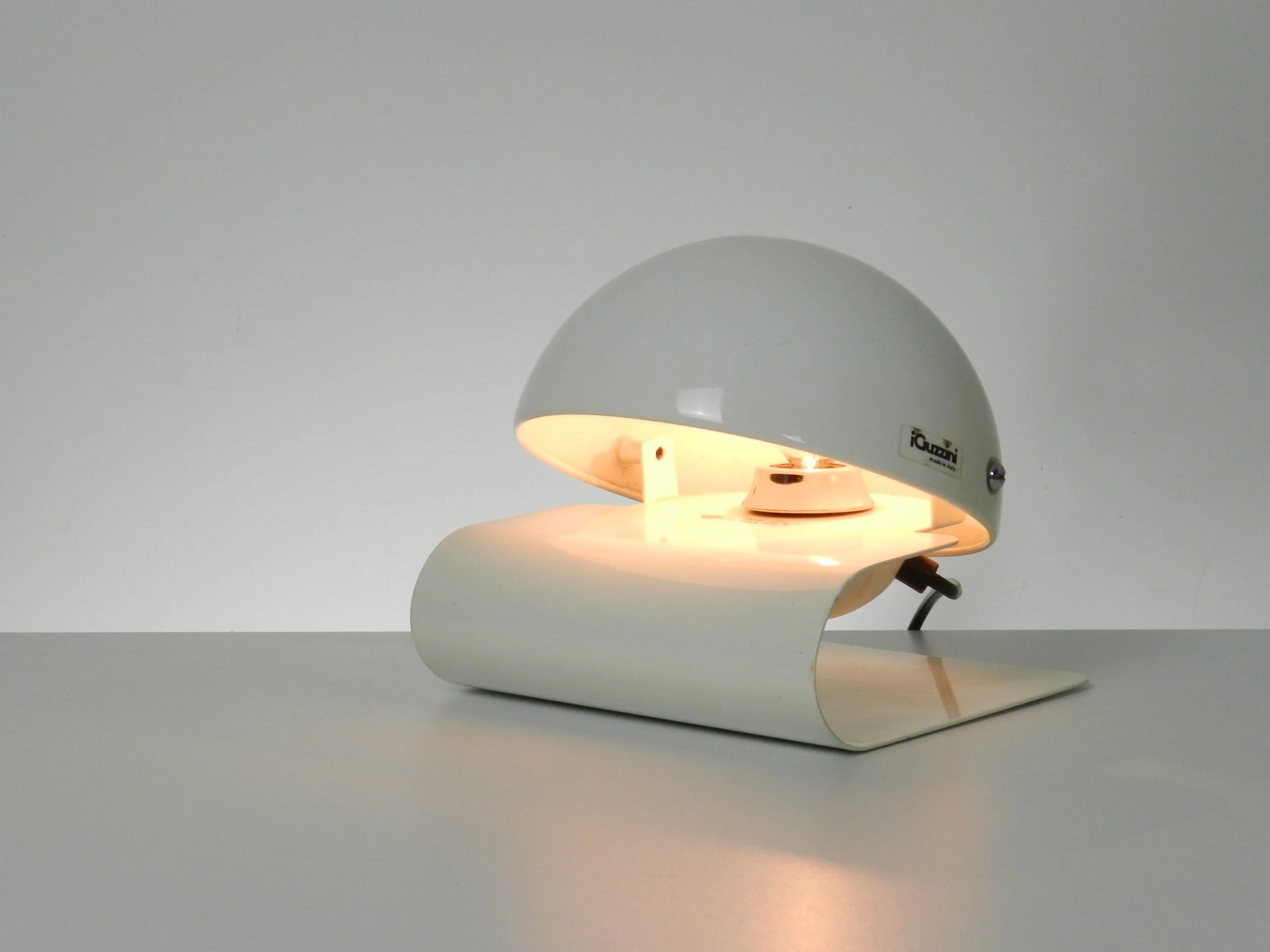 Space age Bugia lamp designed by Giuseppe Cormio for Guzzini.  In enameled metal with adjustable visors.  Italy, 1970s.