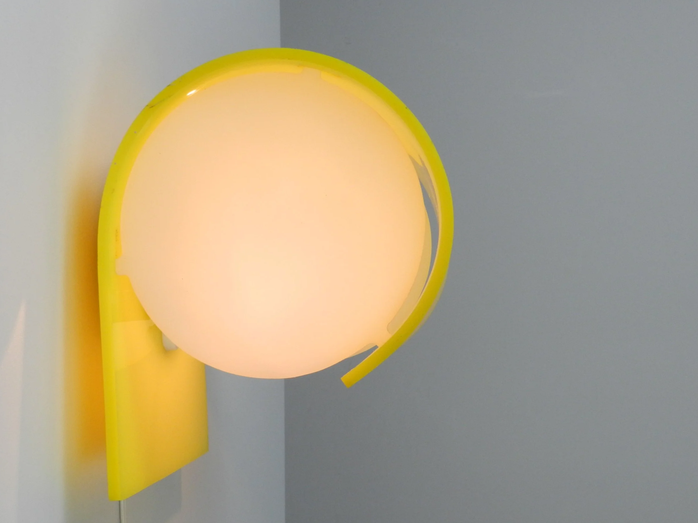 Space age Glo-Up acrylic wall sconce designed by Douglas Ball and John Berezowsky for Danesco.  Canada, 1970s.