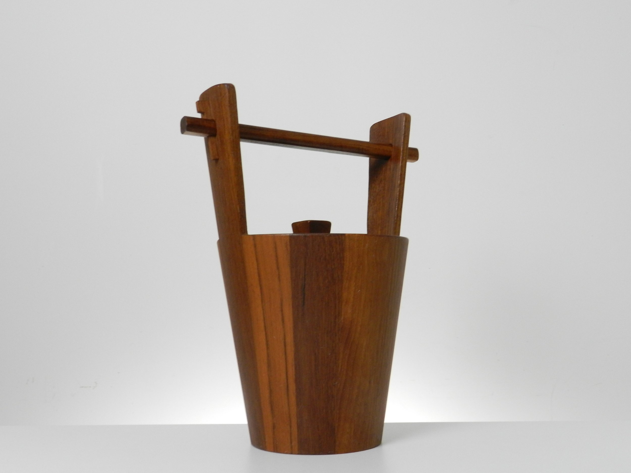 Sculptural mid century modern teak ice bucket by Anri Form.  Italy, 1960s.