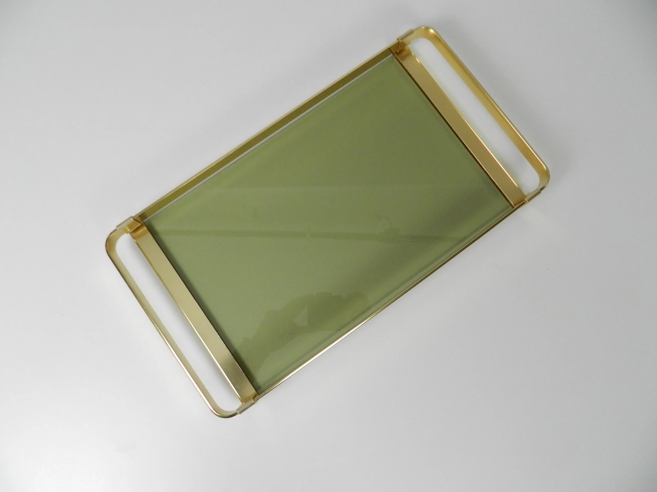 Modernist tray in brass and smoked glass by MB.  Italy, 1970s.