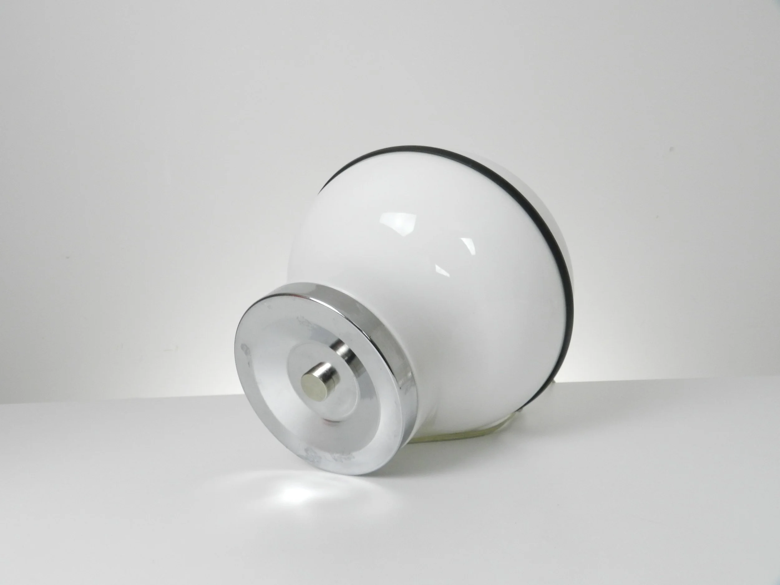 Space age lamp in plastic and chrome attributed to Reggiani.  Italy, 1970s.