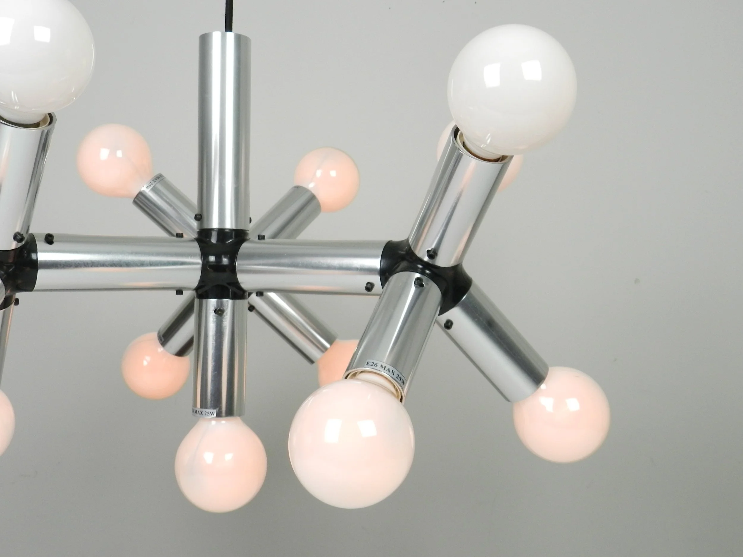 Chandelier in alumunum and plastic designed by Robert Haussmann for Swiss Lamps International.  Switzerland, 1960s.