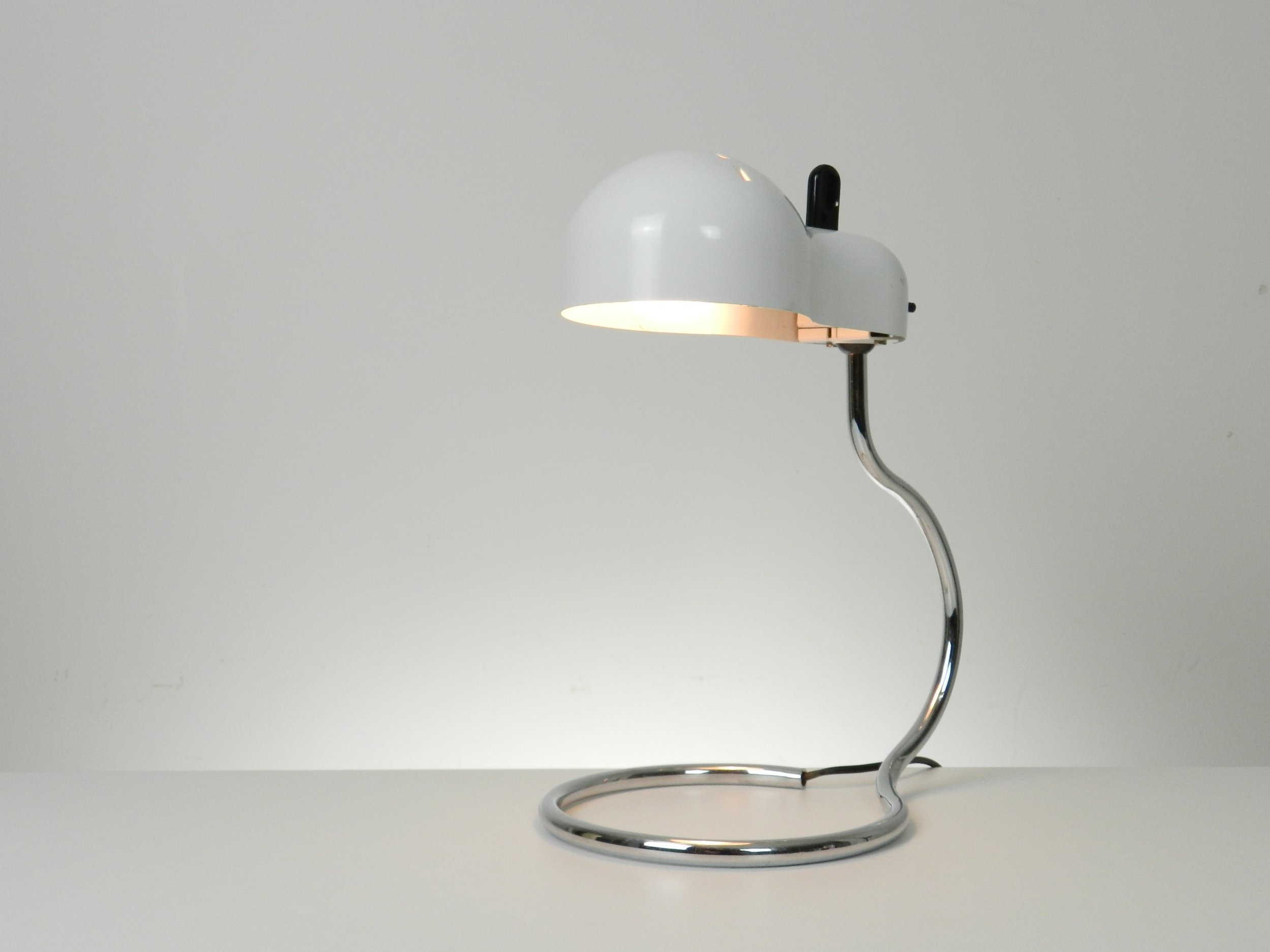 Minitopo table lamp designed by Joe Colombo for Stilnovo.  Italy, 1970s.
