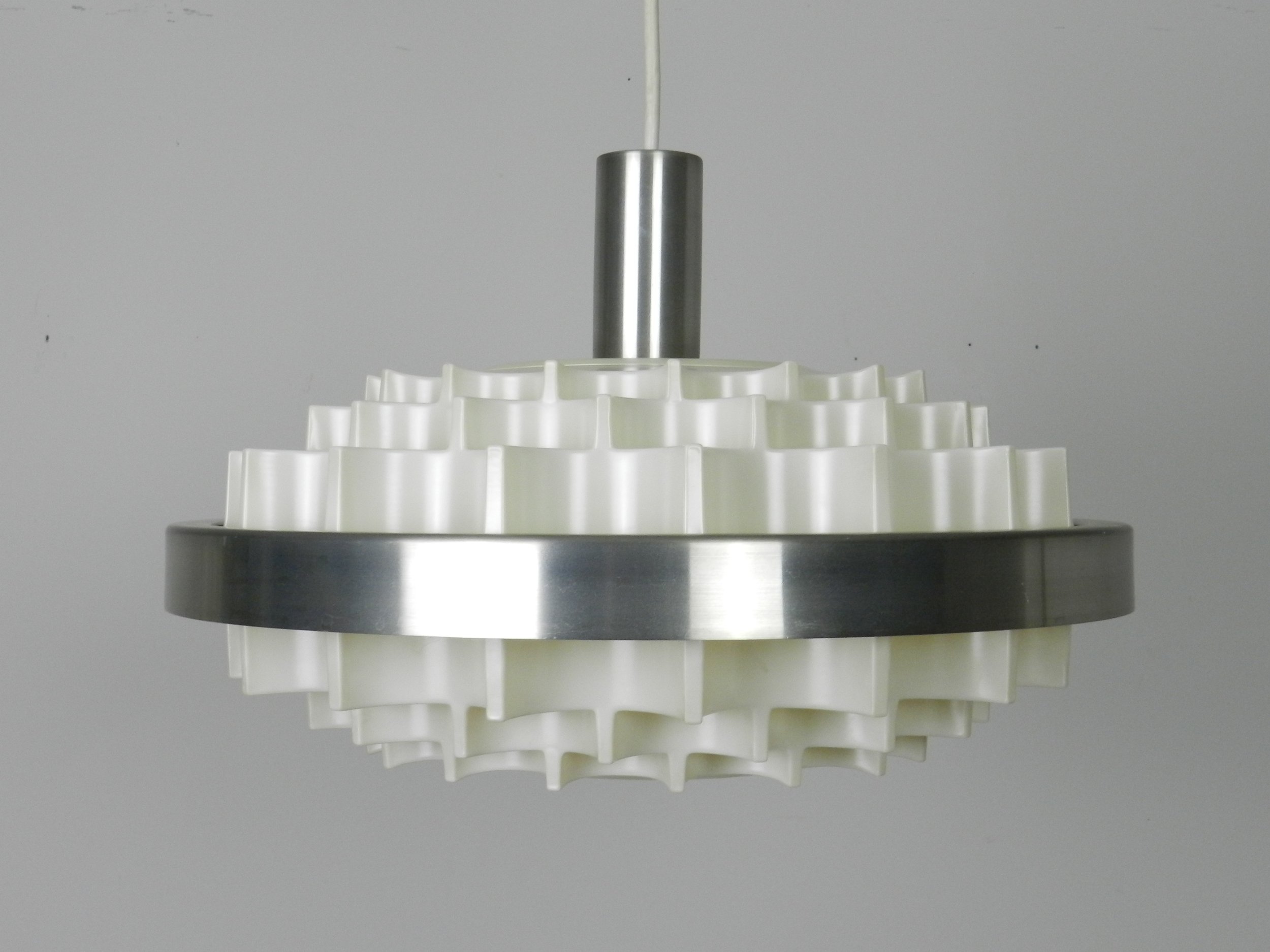 Mid century pendant lamp in plastic and aluminum. Attributed to Lars Schioler for Hoyrup.  Denmark, 1960s.