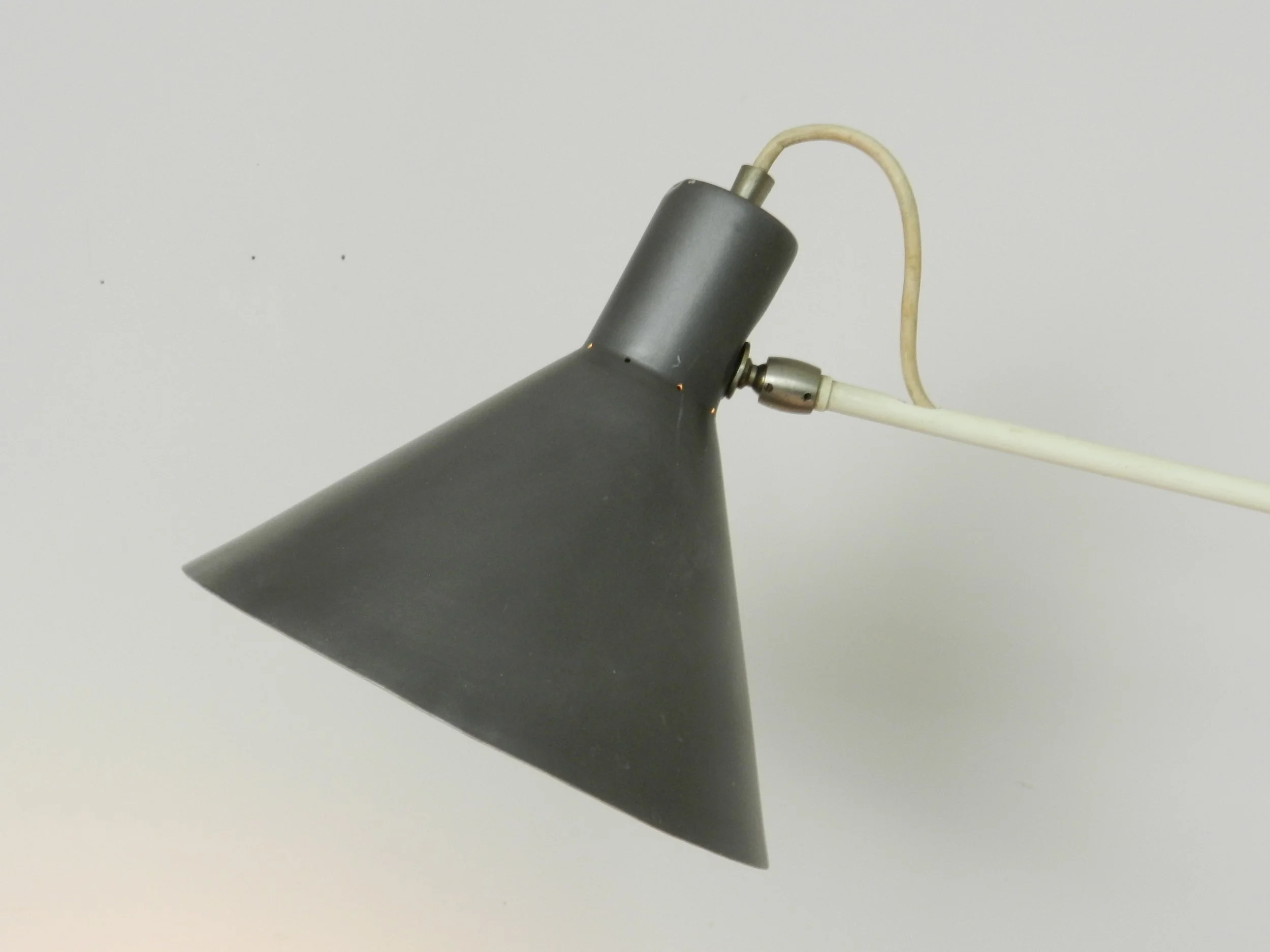 Mid century modern articulating wall lamp designed by JJM Hoogervorst for Anvia.  Netherlands, 1950s.