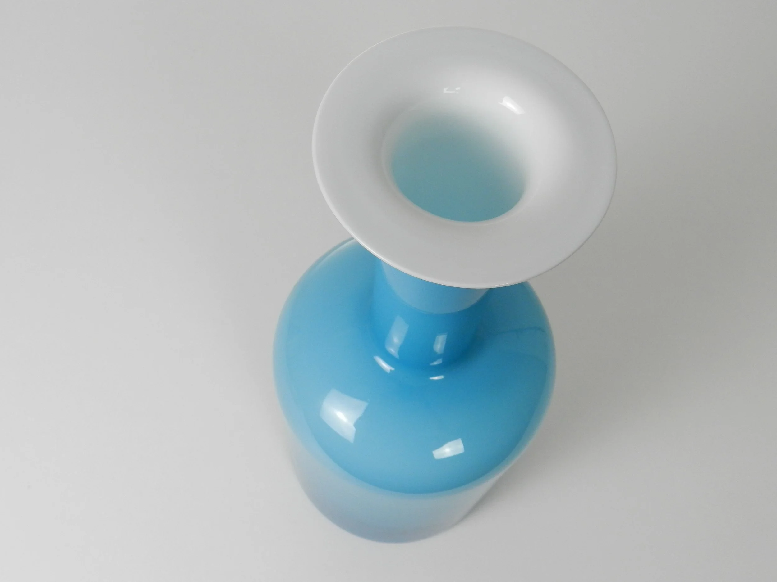 Blue cased glass Gulvase designed by Otto Brauer for Holmegaard.  Denmark, 1960s.