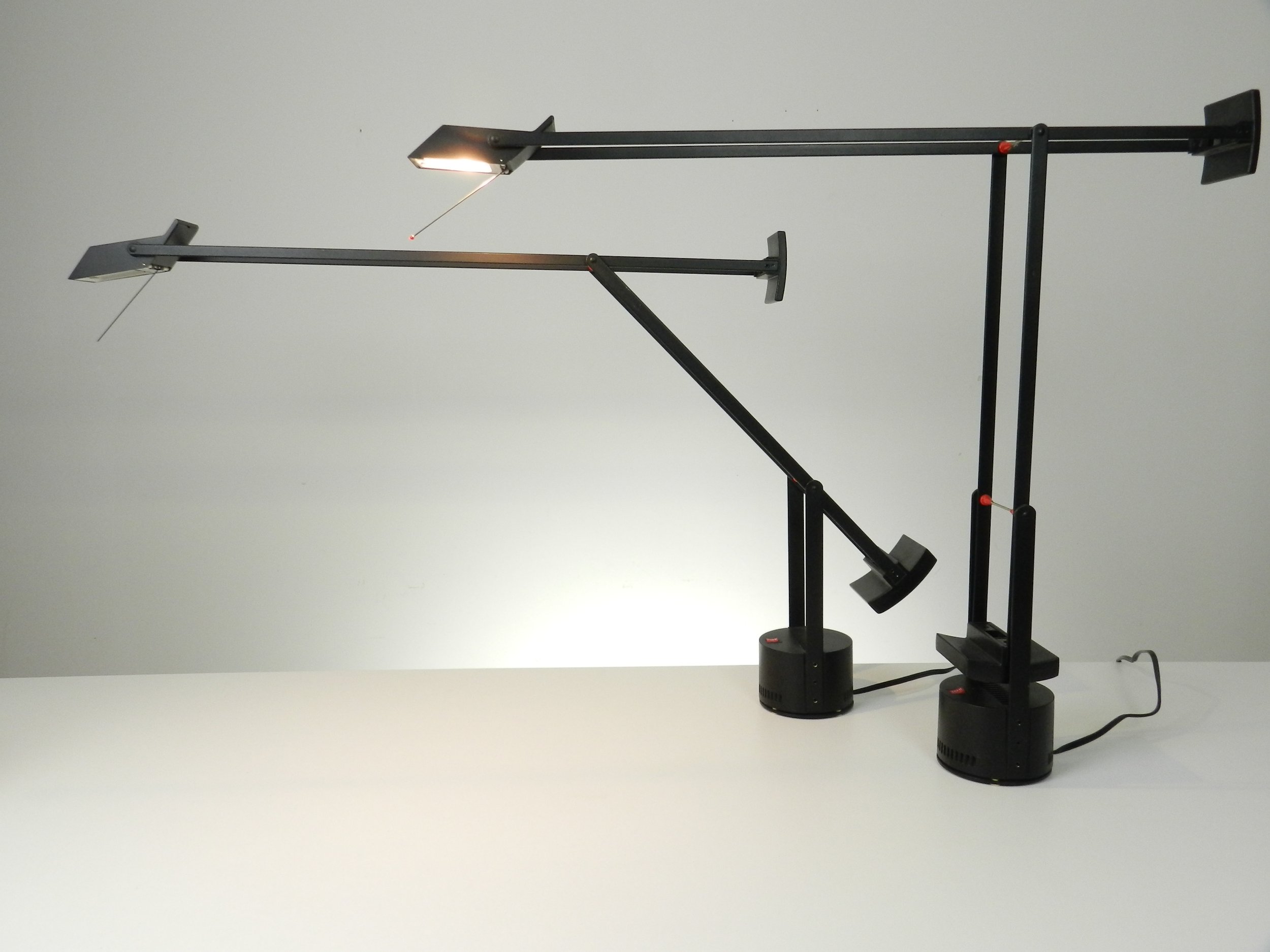 Pair of Tizio lamp designed by Richard Sapper for Artemide.  Italy, 1970s.
